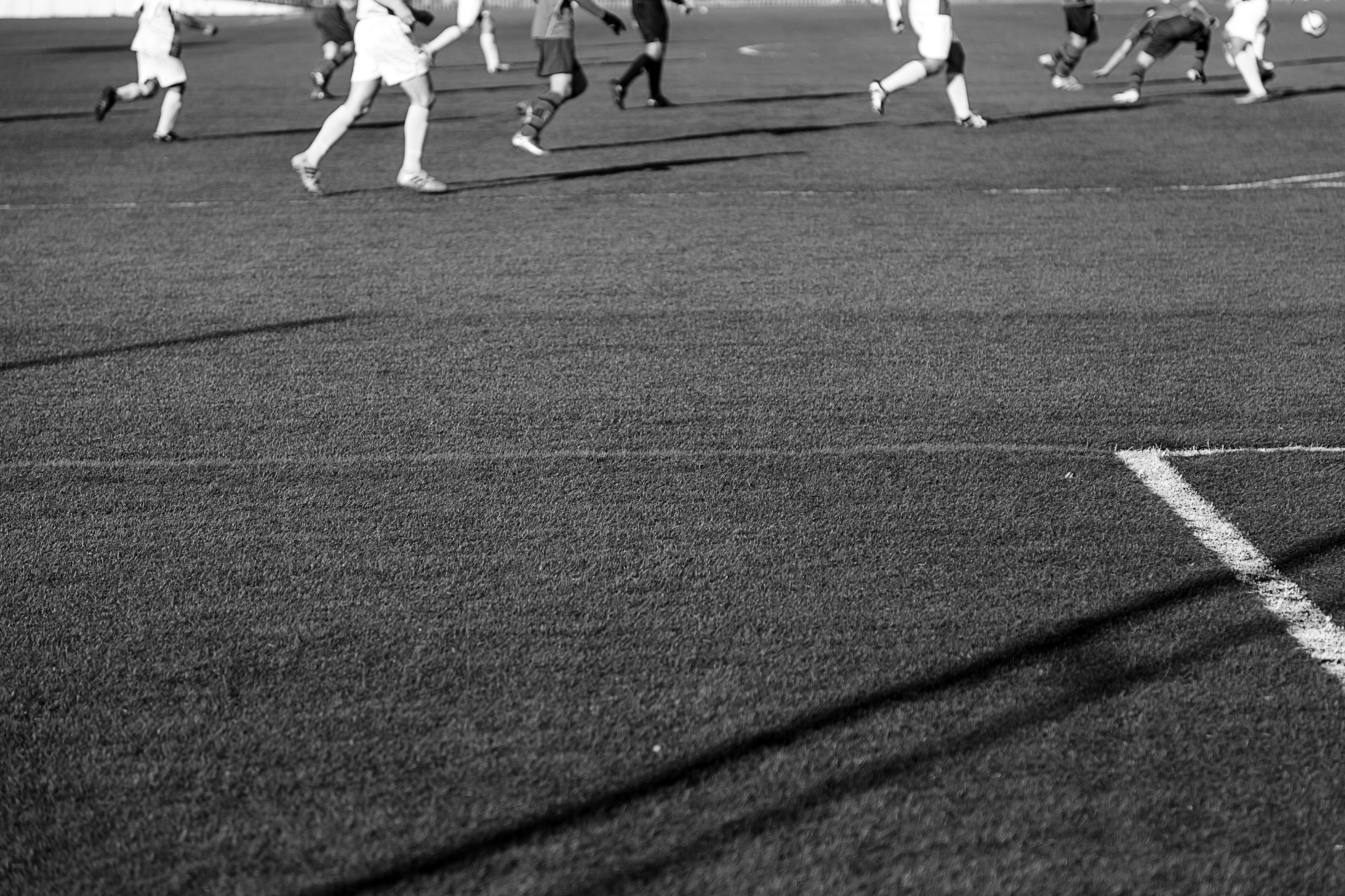 Standing on the sideline of a soccer game