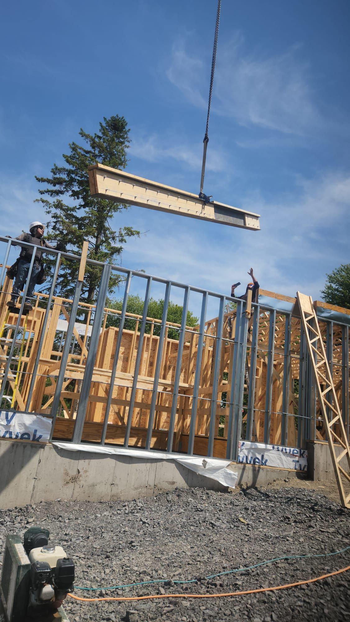 Hybrid steel wood framing triplex Orléans crane beam