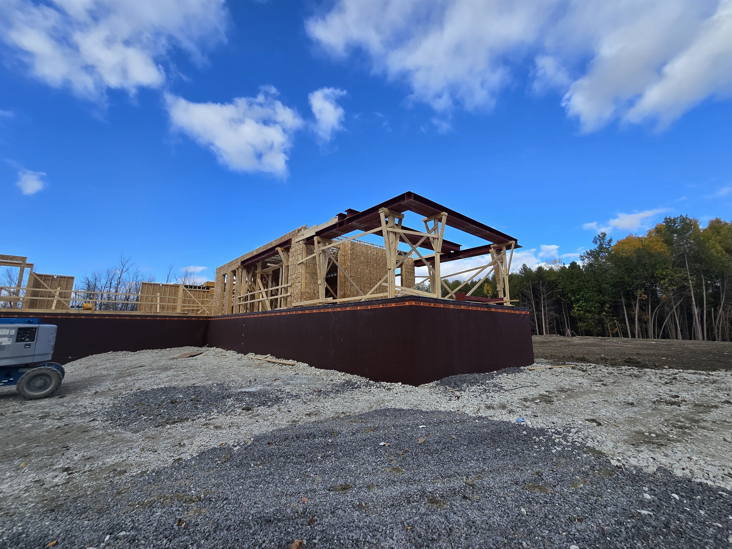Custom home framing with steel beams Manotick