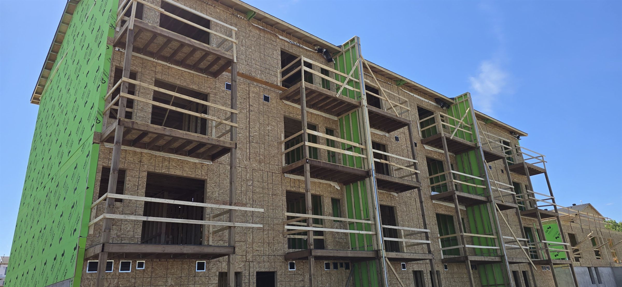 Multi-storey wood-framed apartment building framing Ottawa