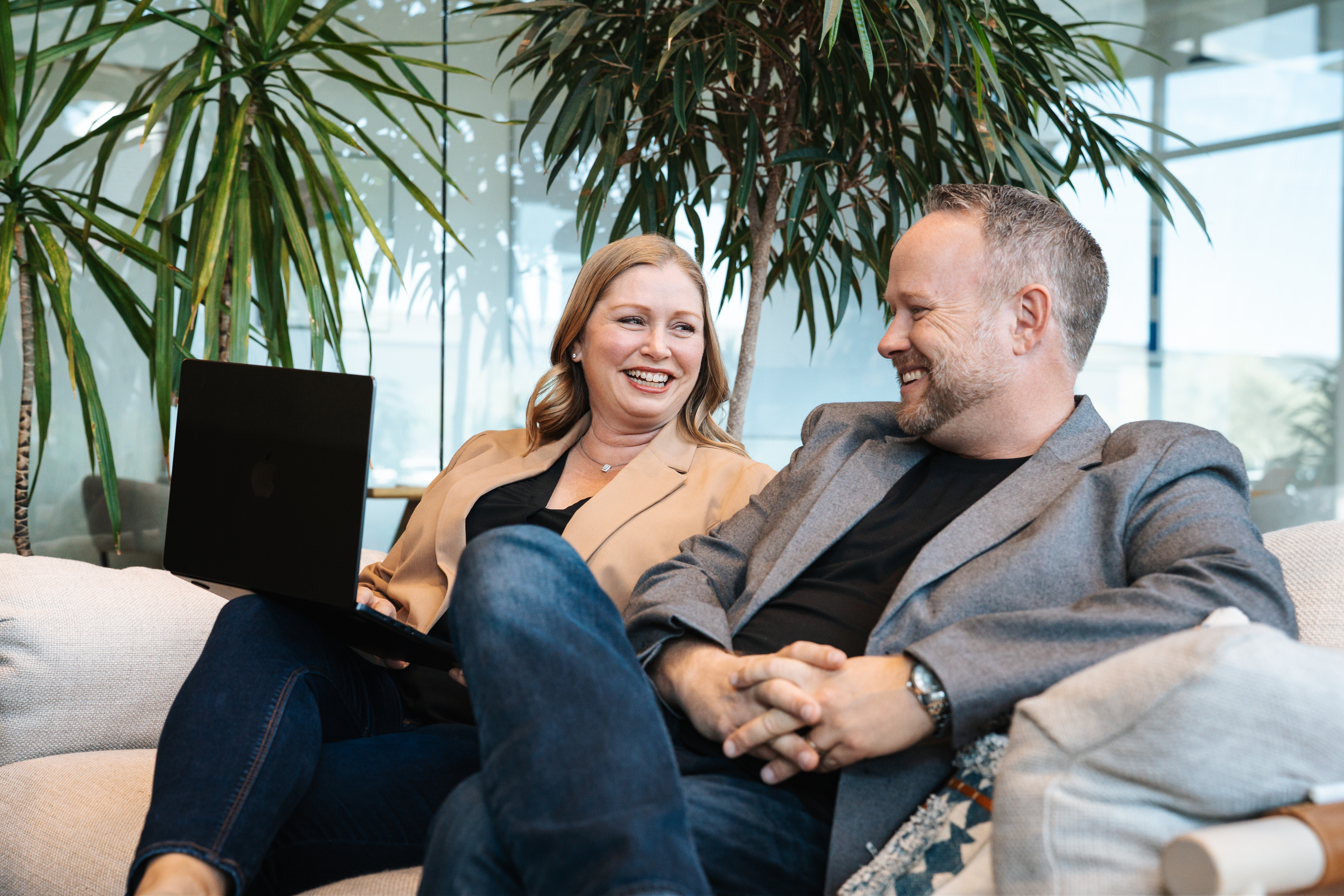 Paul and Alisha Anderson at the office