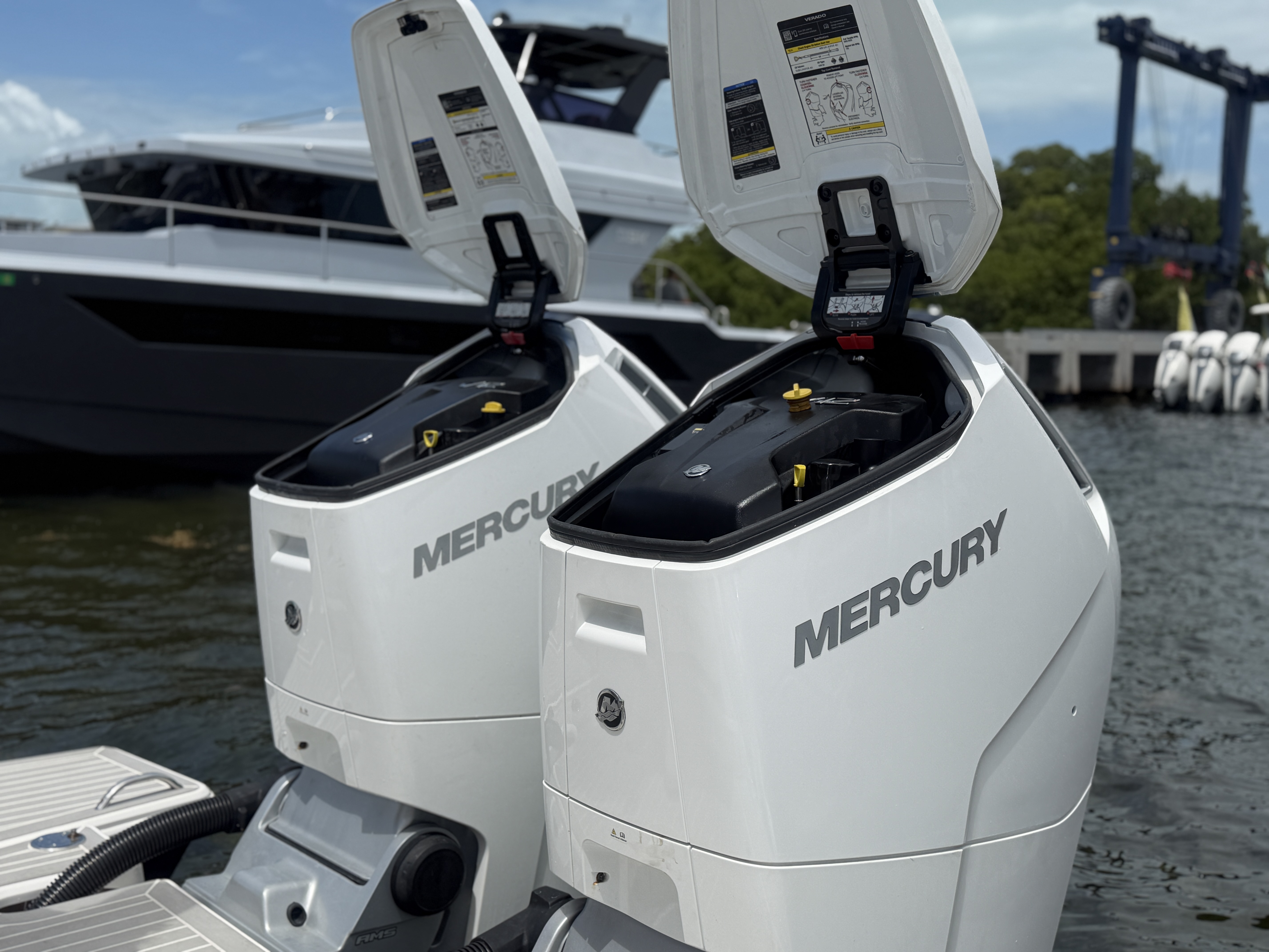 Service on twin Mercury 600hp V12 outboards 