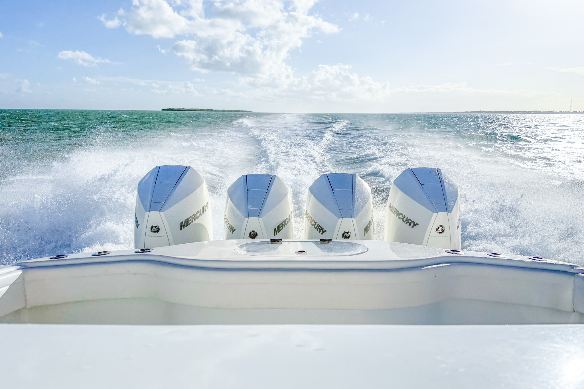 Quad Mercury outboards on a 39 yellowfin 