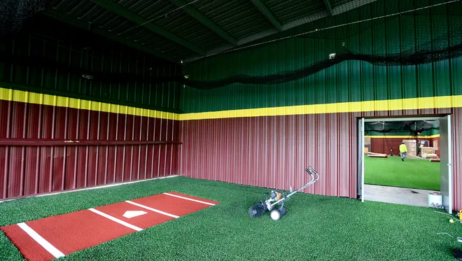 [Batting cages inside a training facility] built by Silverleaf in [city], Texas