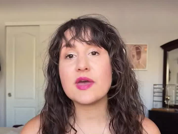 Katelyn Alexander speaking on video