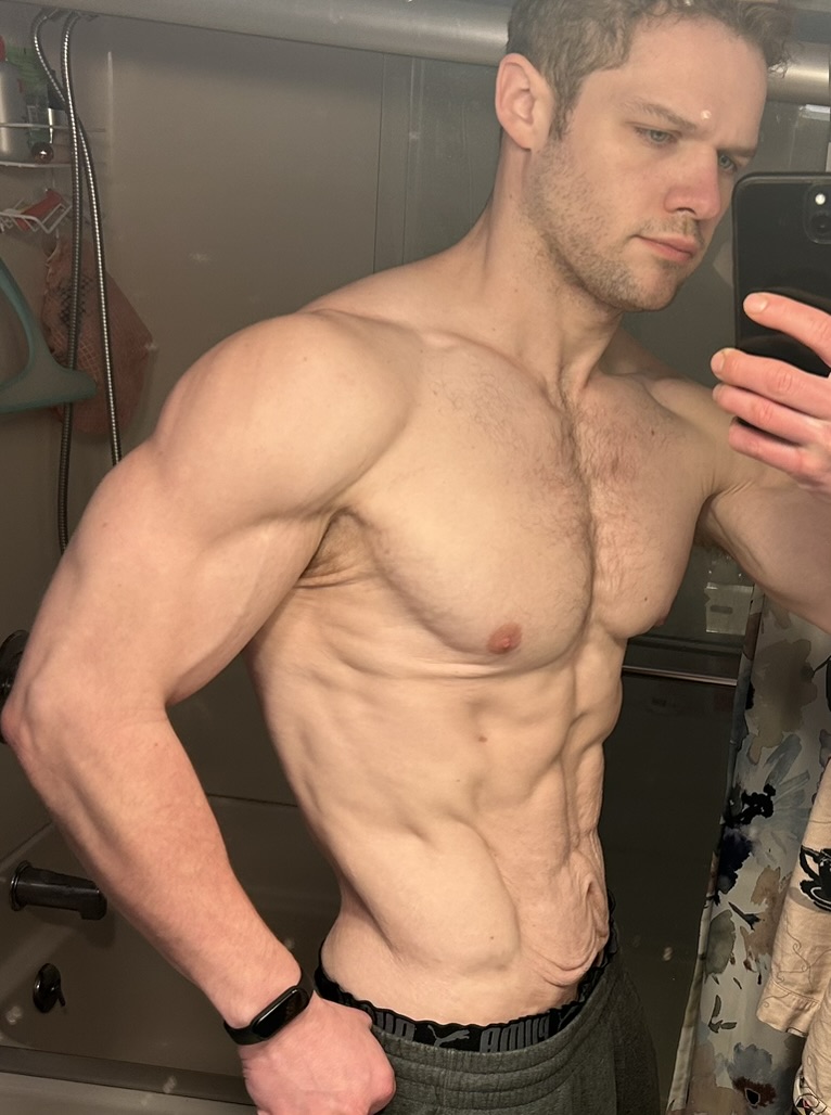 Steve Lutz after, showing his fitness progress in a mirror photo.