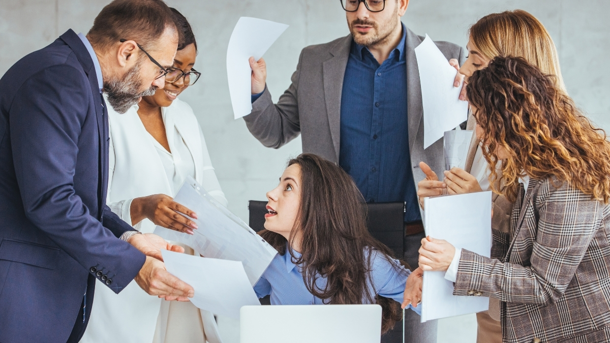 team experiencing confusion and misalignment during a stressful workplace discussion team experiencing confusion and misalignment during a stressful workplace discussion