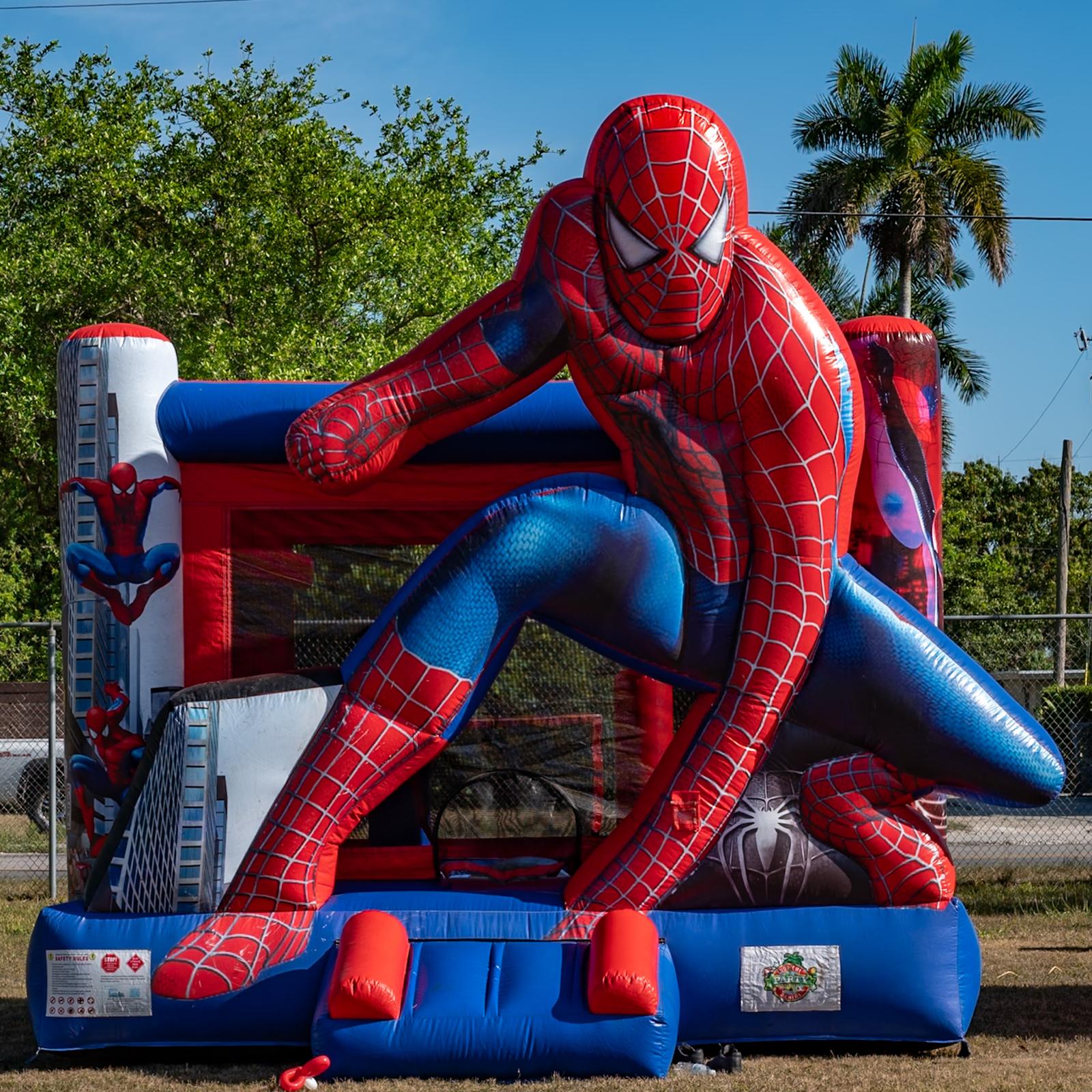 Tropical Party Rental bounce house and party rentals set up at a Homestead celebration