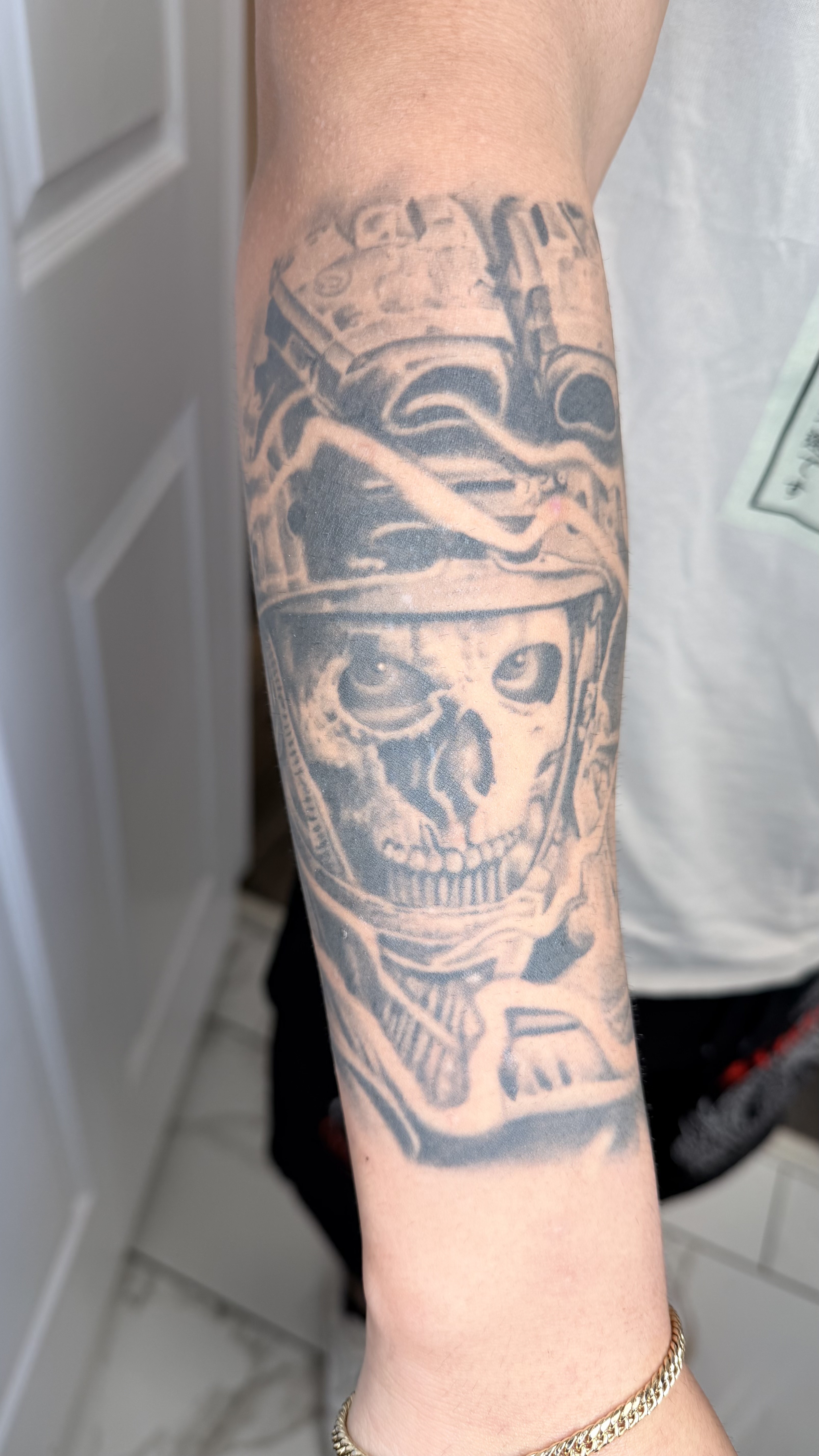 Black and grey sleeve custom tattoo by Drop 'N Ink Tattoo Studio, Toms River NJ