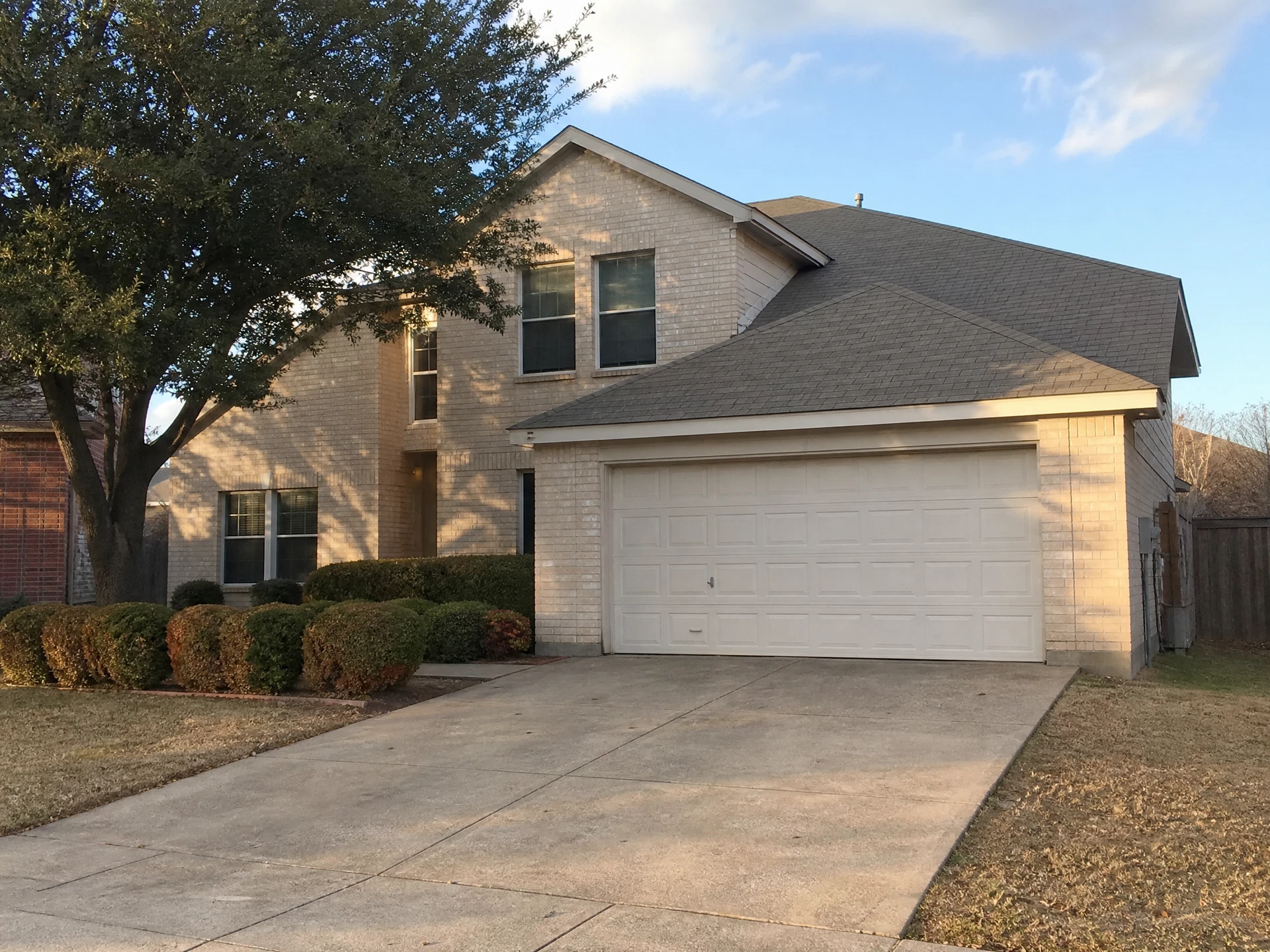 Suburban brick rental house in Plano, Texas