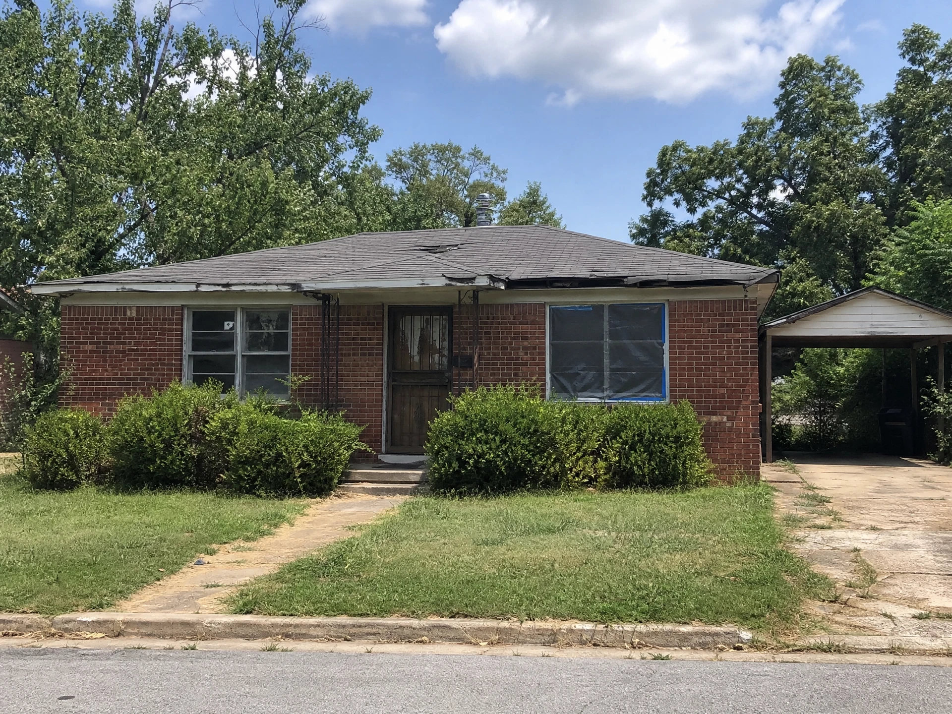 Distressed brick ranch house in Little Rock, Arkansas