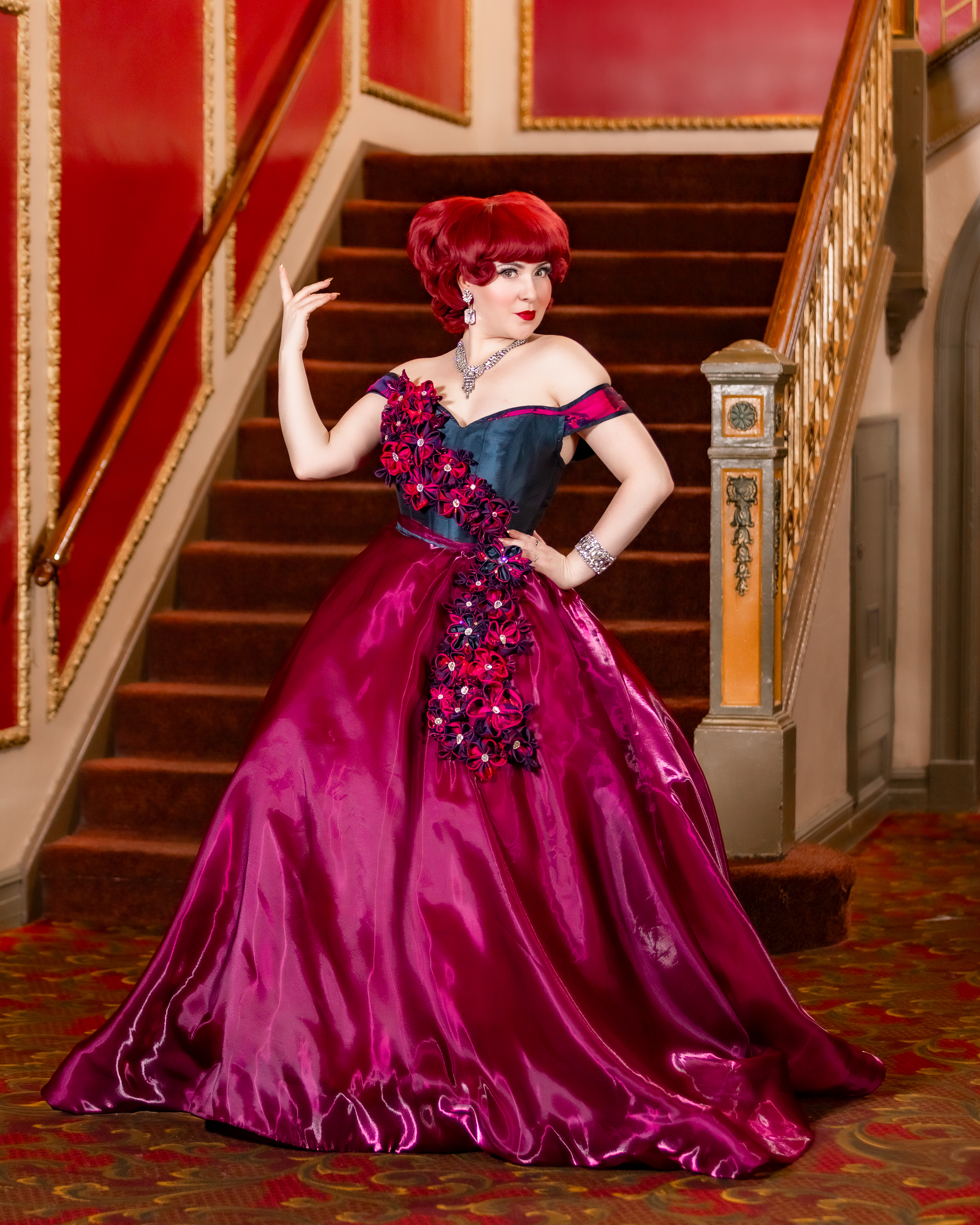 Custom off-the-shoulder magenta and navy ballgown
