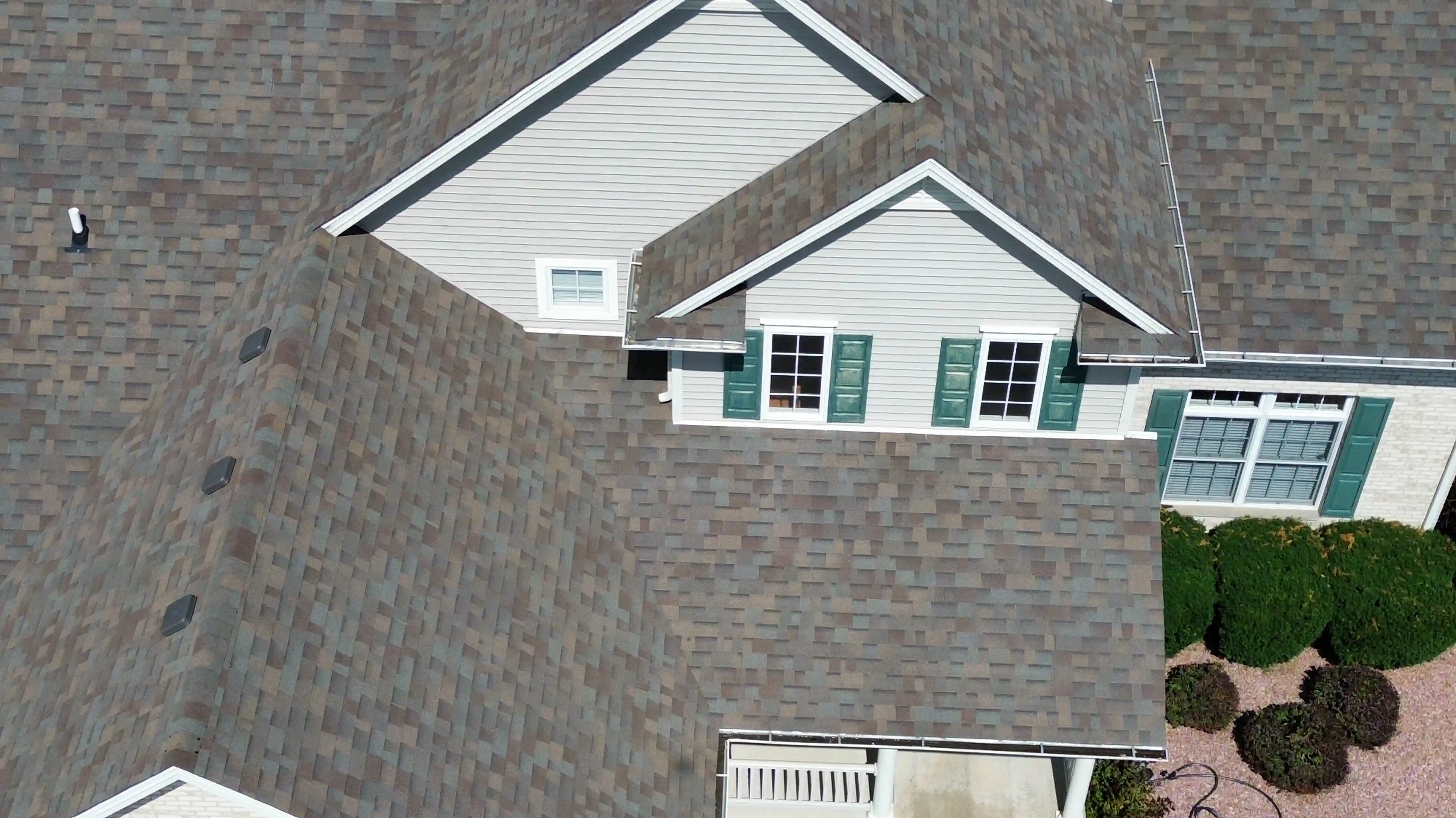 Completed roof replacement on Georgetown, TX home with fresh asphalt shingles