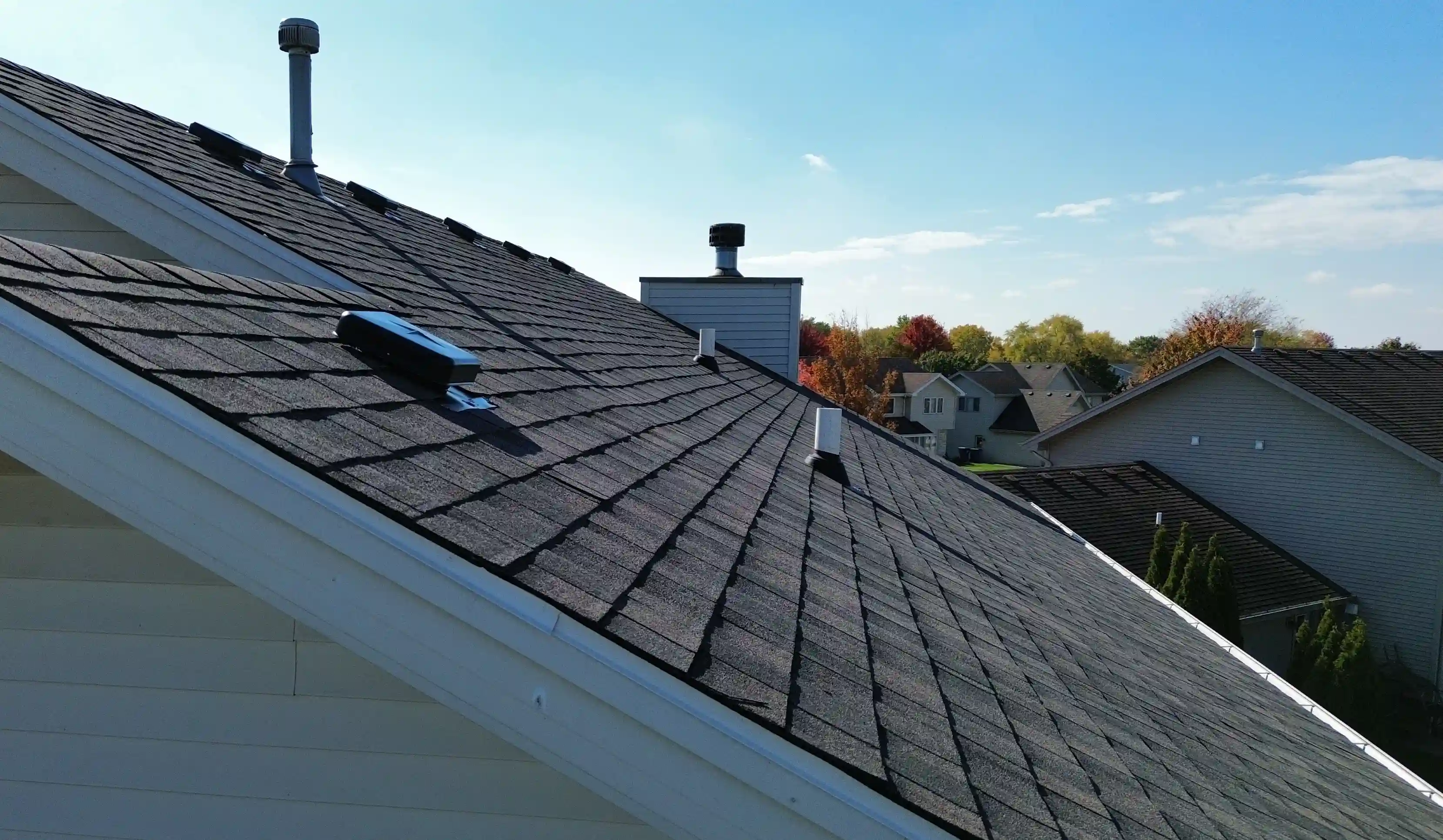 Completed roof replacement on Georgetown, TX home with fresh asphalt shingles