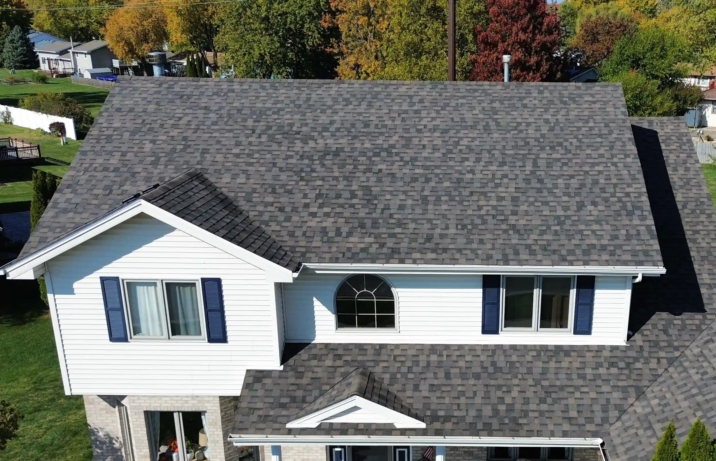 Completed roof replacement on Georgetown, TX home with fresh asphalt shingles