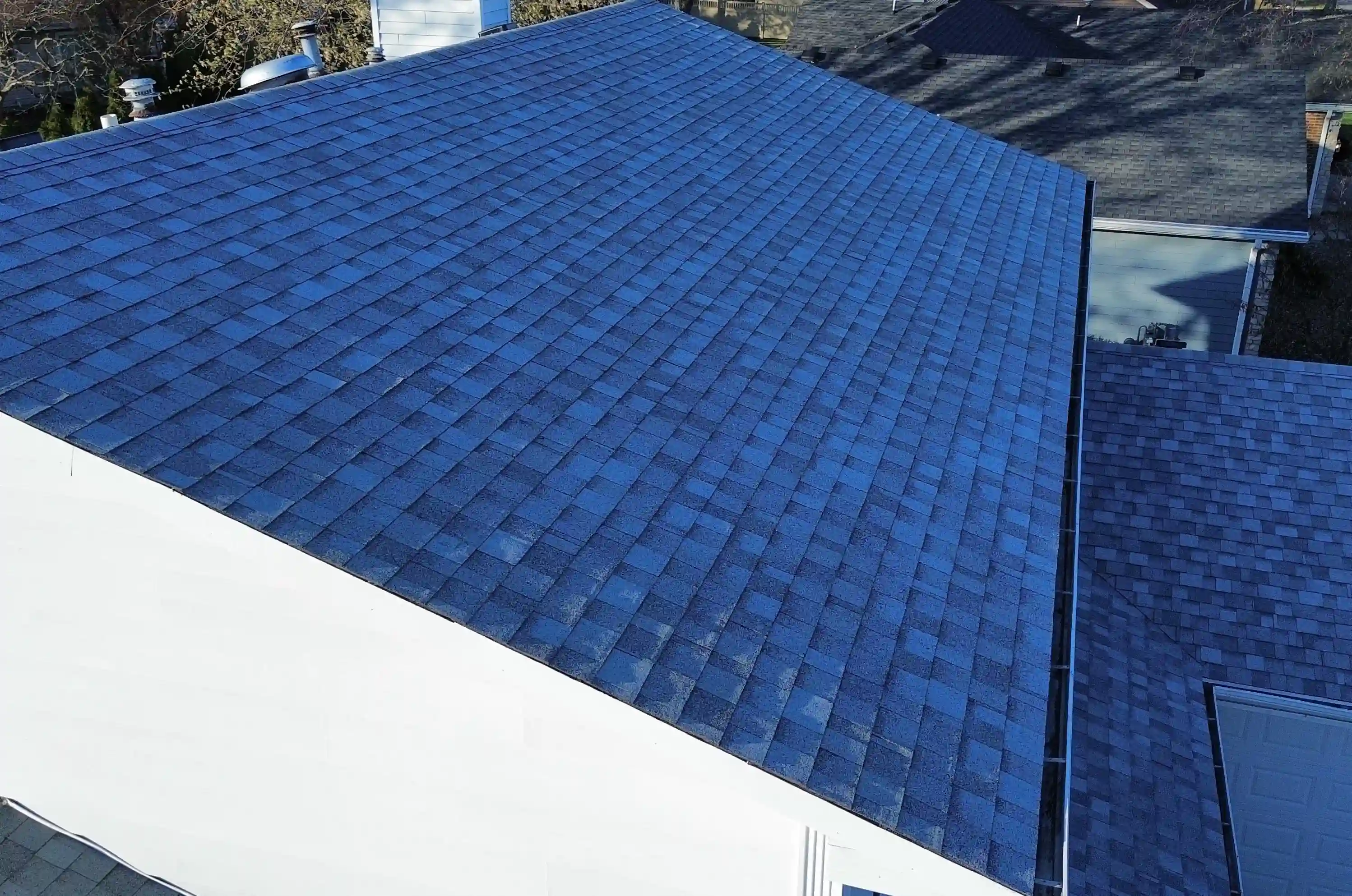 Roof inspection in progress on Georgetown, TX home with visible tools and safety lines