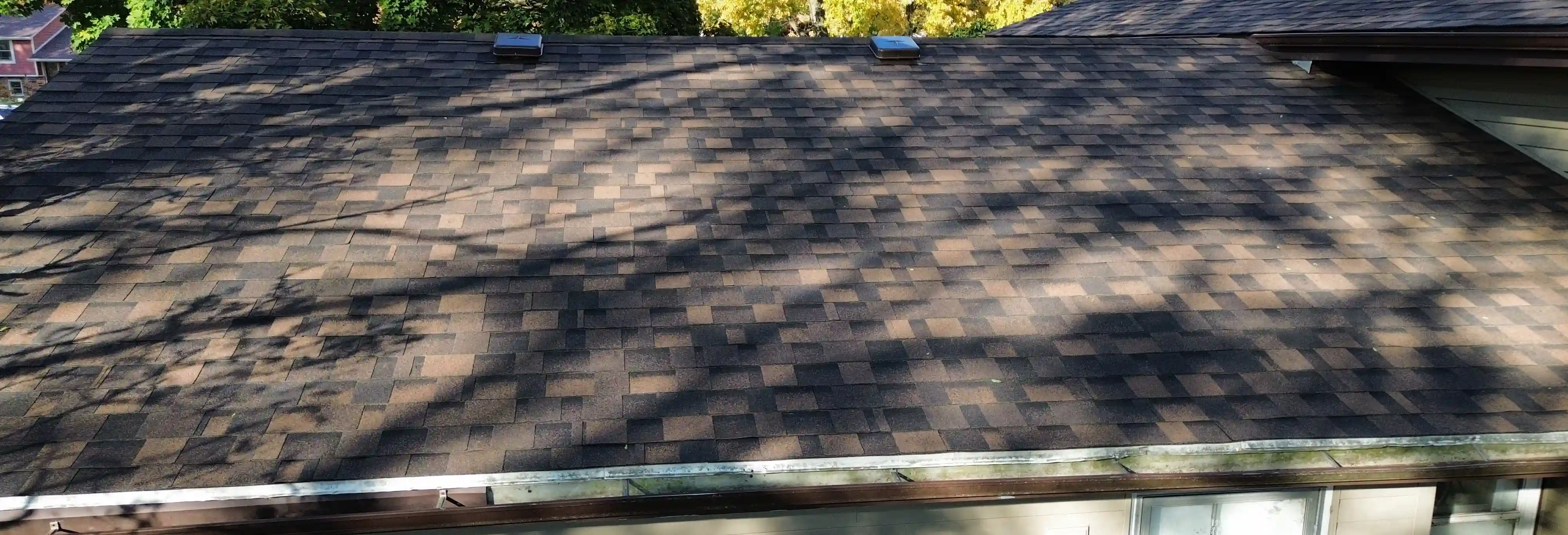 Roof inspection in progress on Georgetown, TX home with visible tools and safety lines