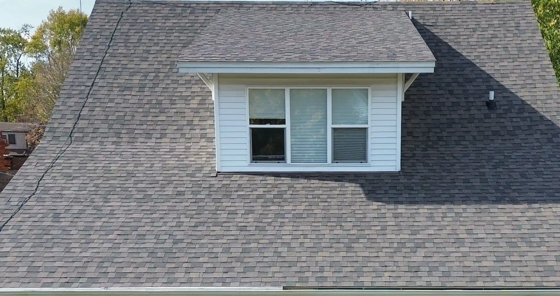 Completed roof replacement on Georgetown, TX home with fresh asphalt shingles