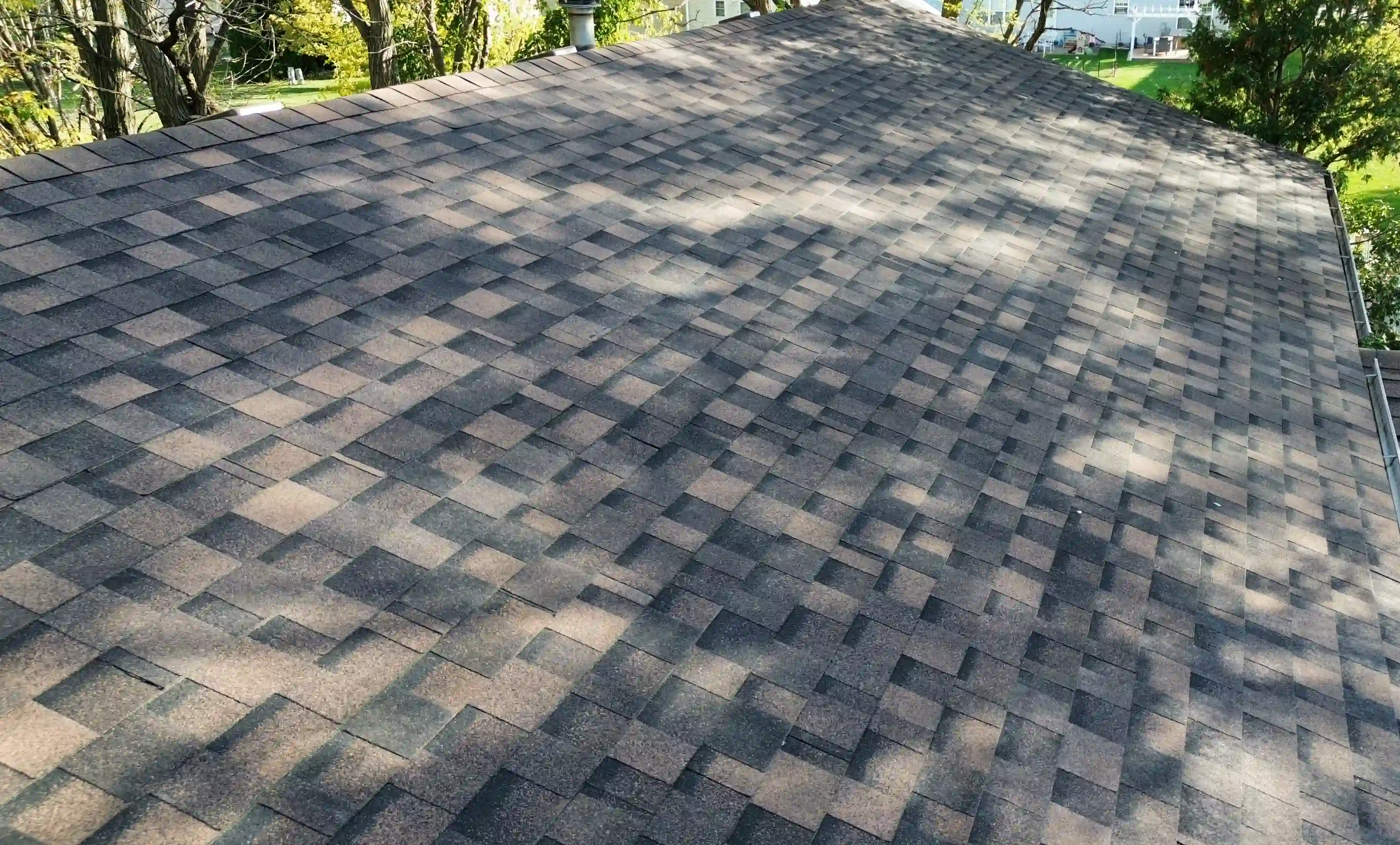 Completed roof replacement on Georgetown, TX home with fresh asphalt shingles