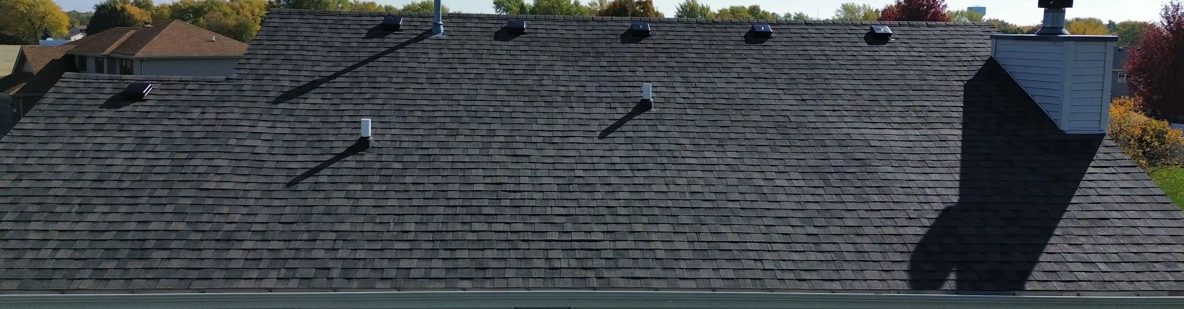 Roof inspection in progress on Georgetown, TX home with visible tools and safety lines