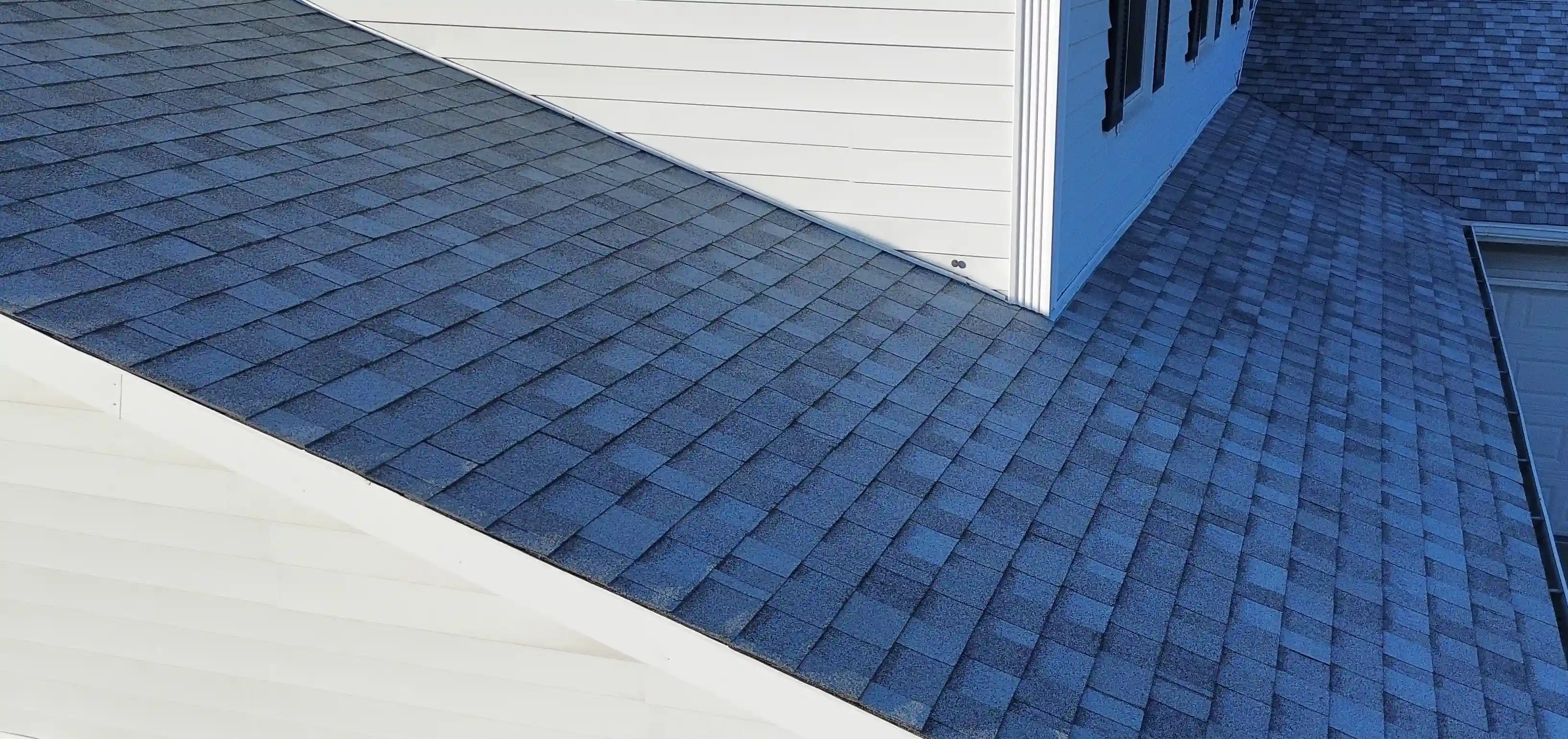 Roof with severe storm damage and missing shingles in Georgetown, TX before restoration