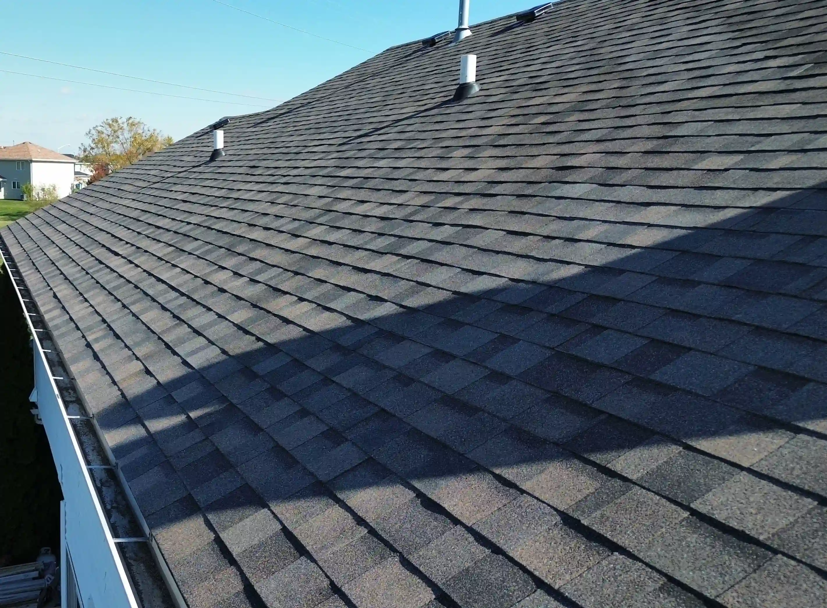 Roof inspection in progress on Georgetown, TX home with visible tools and safety lines