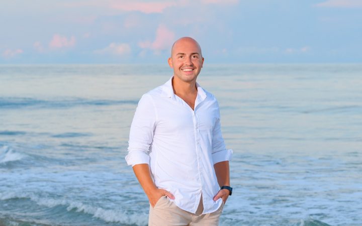 Benjamin Horvat on a Gulf Coast beach at sunset