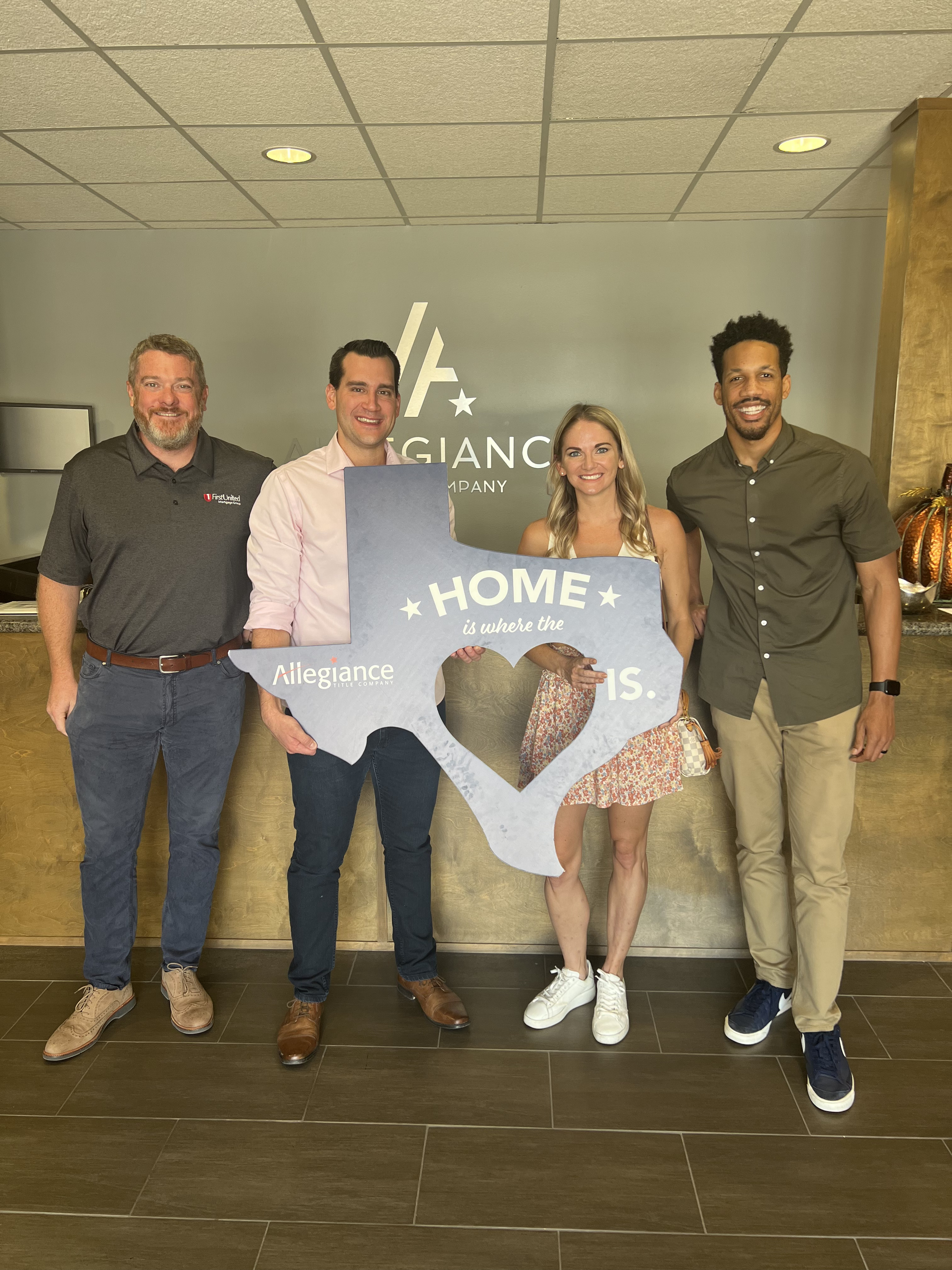 DFW family celebrating closing day on their new property