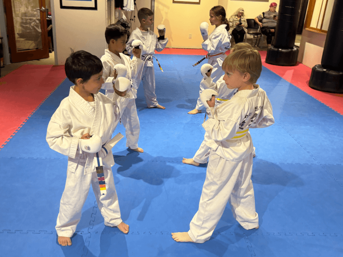 Children practicing karate with focus and discipline