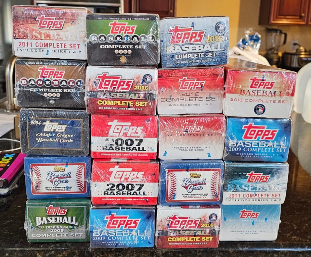 Stacks of sealed complete baseball card sets