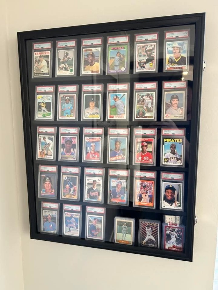 Framed display of graded rookie cards