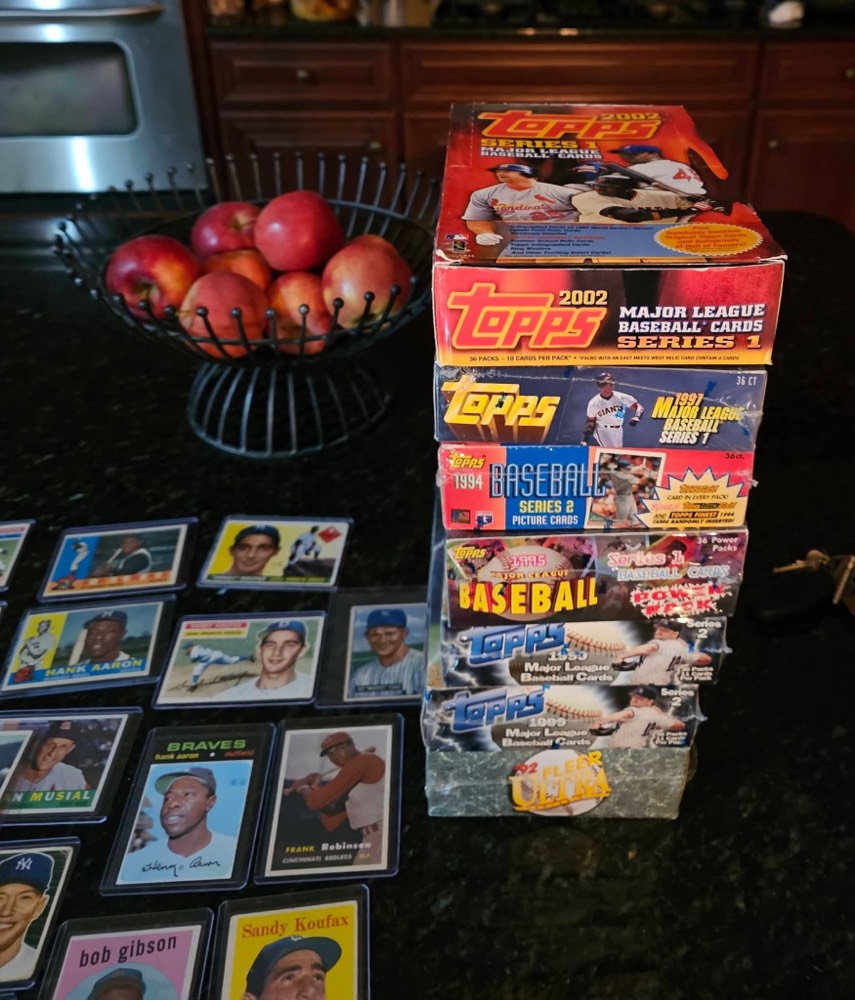 Vintage cards laid out with wax boxes
