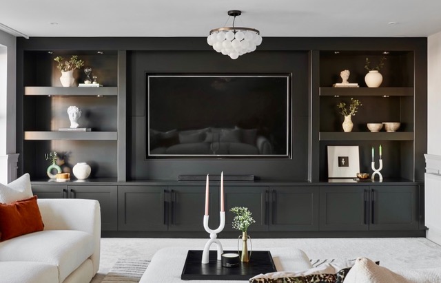 Bespoke media wall with integrated TV unit, cabinetry and shelving — a completed JAX Bespoke installation