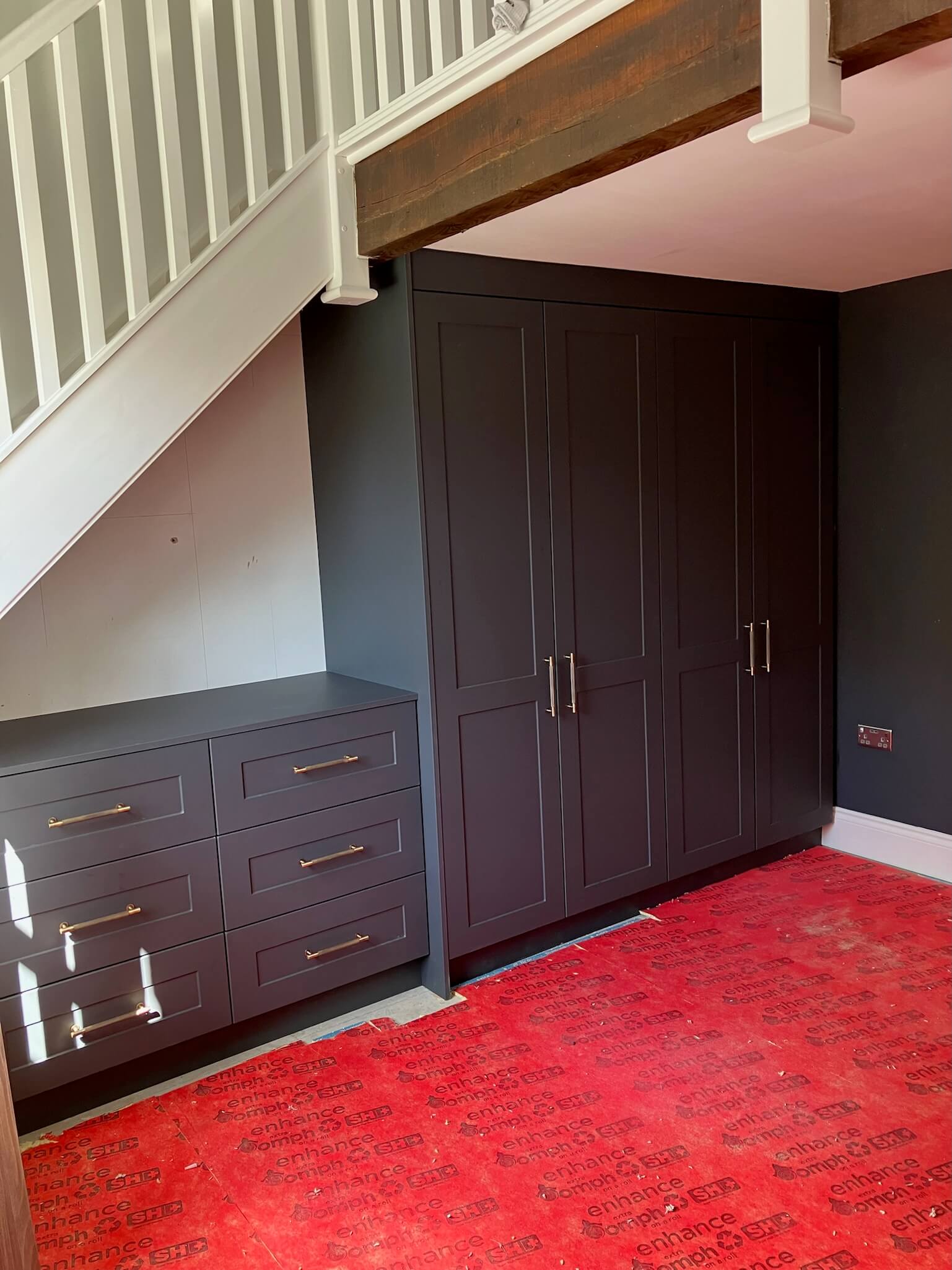 Bespoke fitted wardrobe interior showing tailored storage organisation, designed by JAX Bespoke