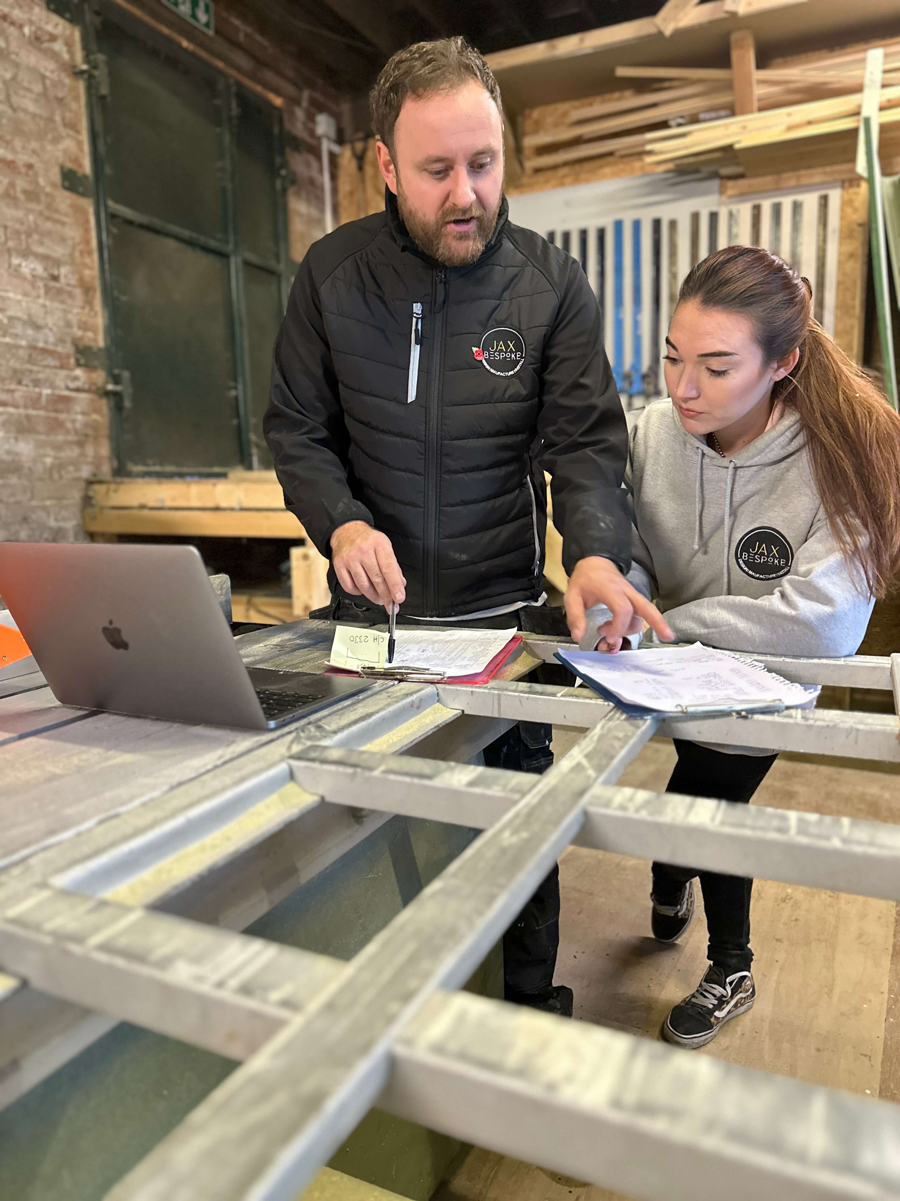 Jack and Chloe Westmoreland finalising a bespoke furniture design in the JAX Bespoke Wakefield workshop