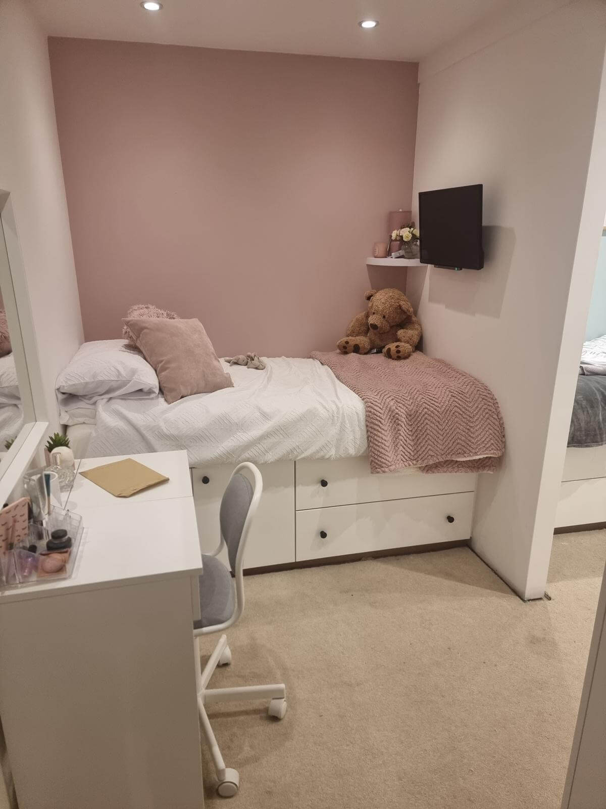 Completed built-in bed and storage on one side of a partition wall in a shared sisters' bedroom, by JAX Bespoke