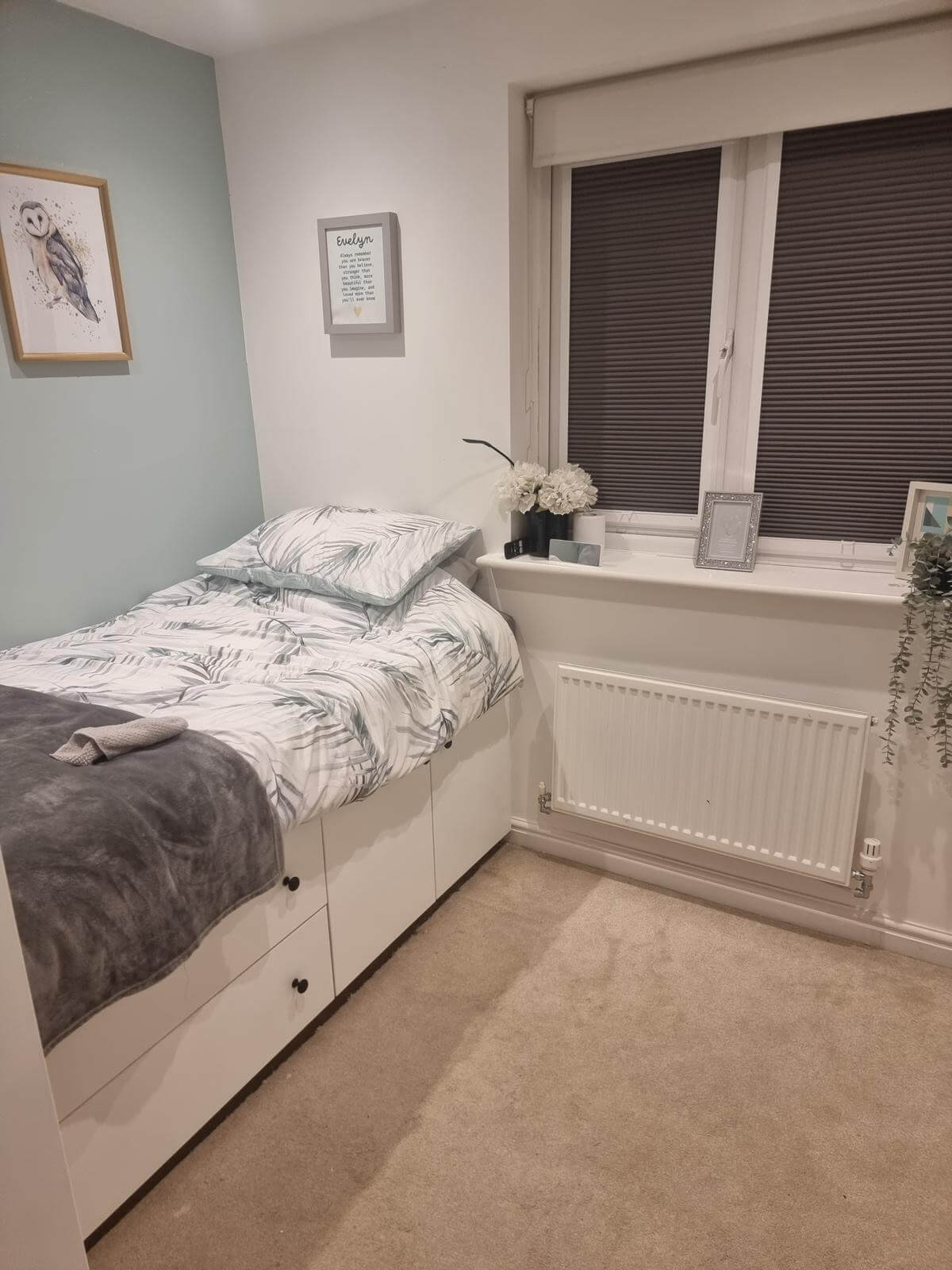 Completed built-in bed and storage drawers on the opposite side of the same partition wall, by JAX Bespoke