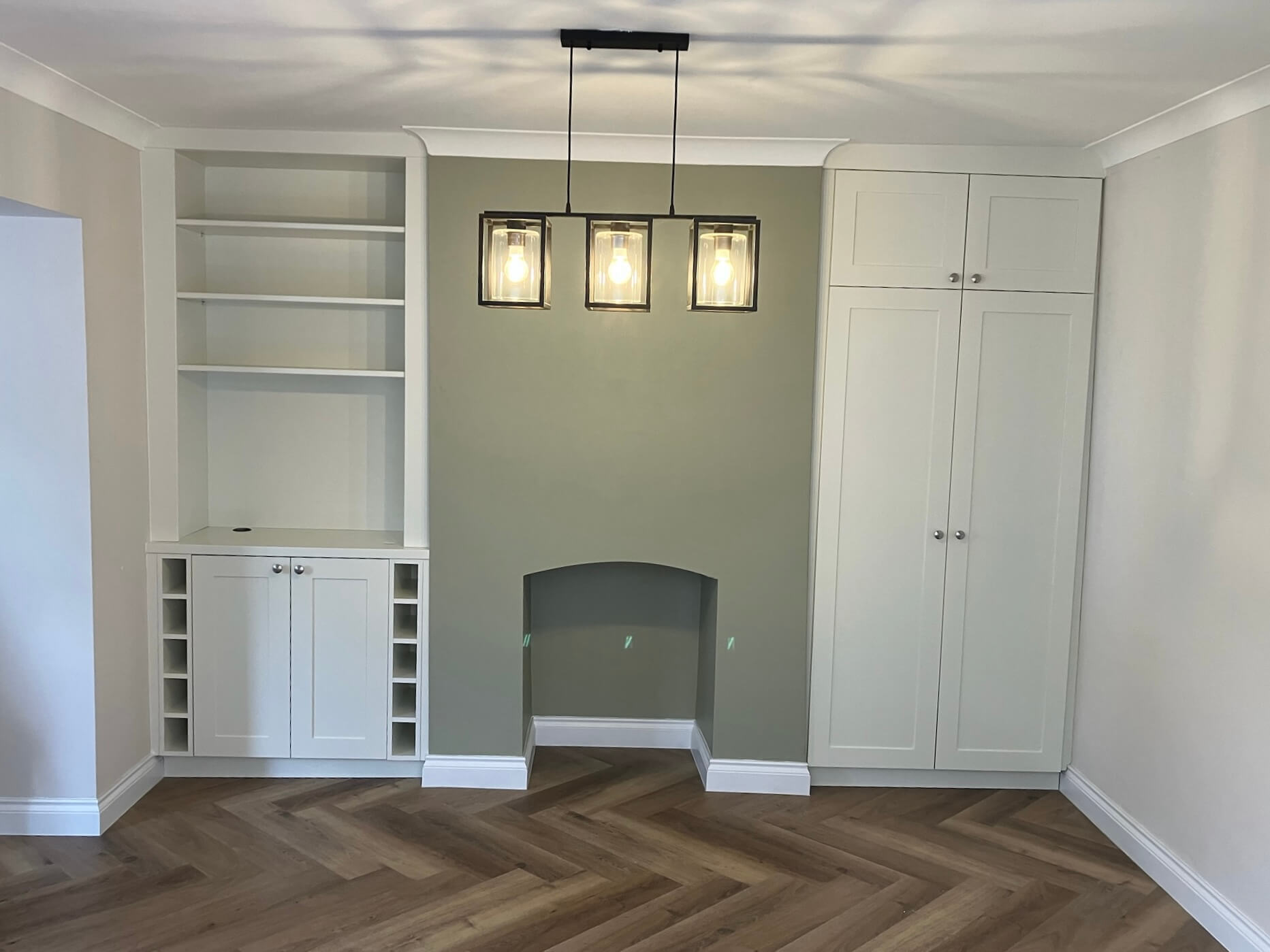 Fitted alcove shelving and cabinetry built precisely into a period property by JAX Bespoke