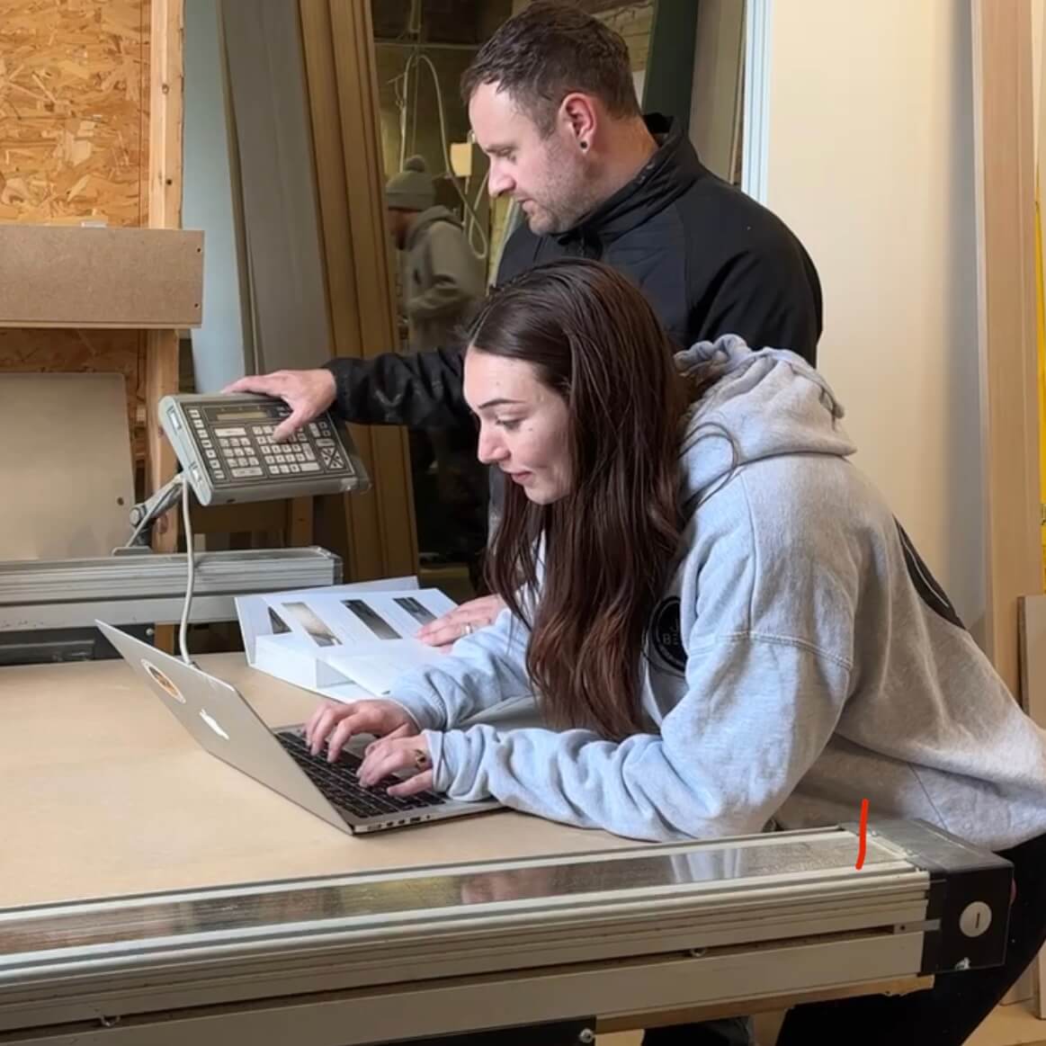 Jack Westmoreland meeting a customer to measure up and discuss a bespoke furniture design