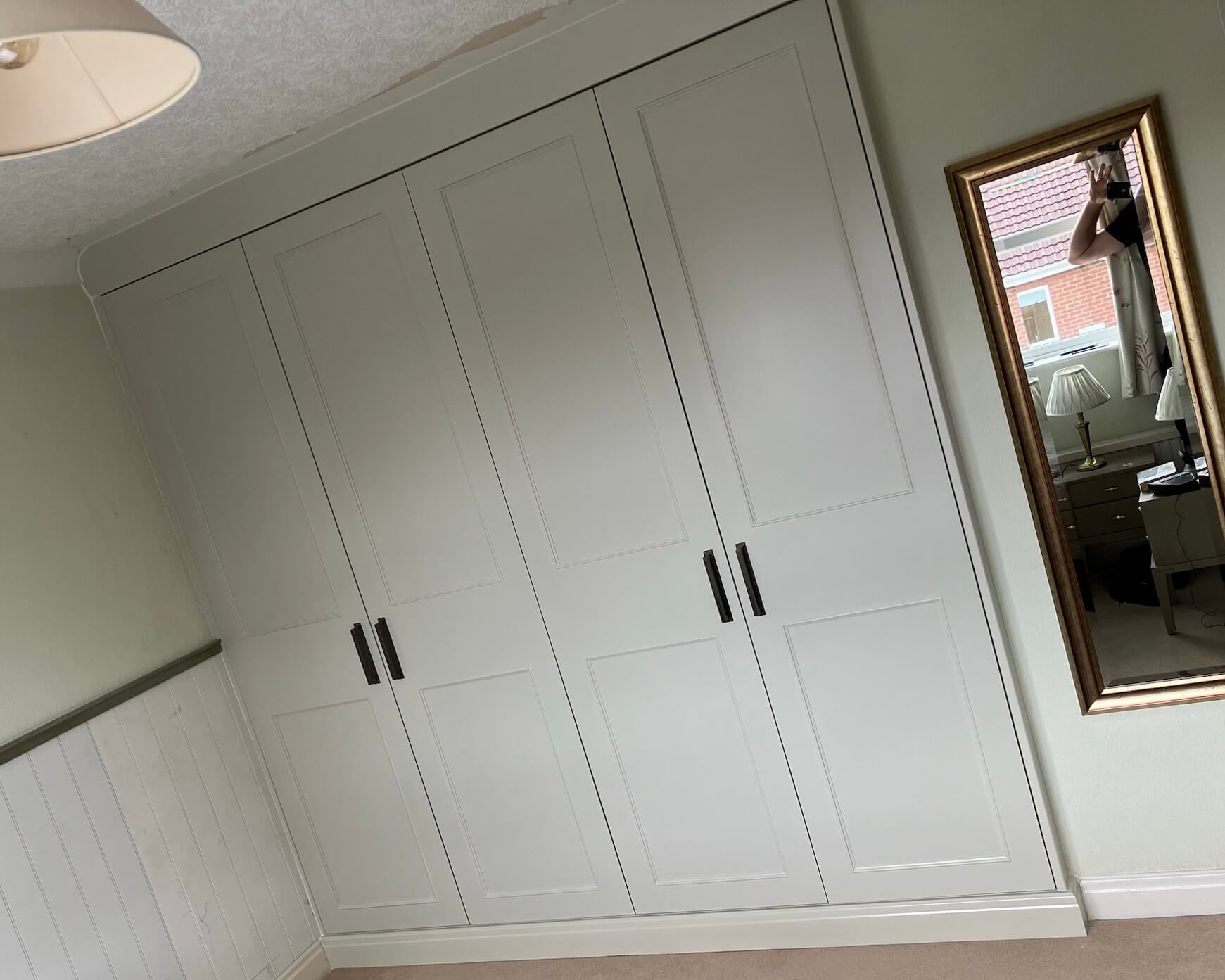 Sprayed grey shaker door wardrobe with matt grey handles by JAX Bespoke — Leeds