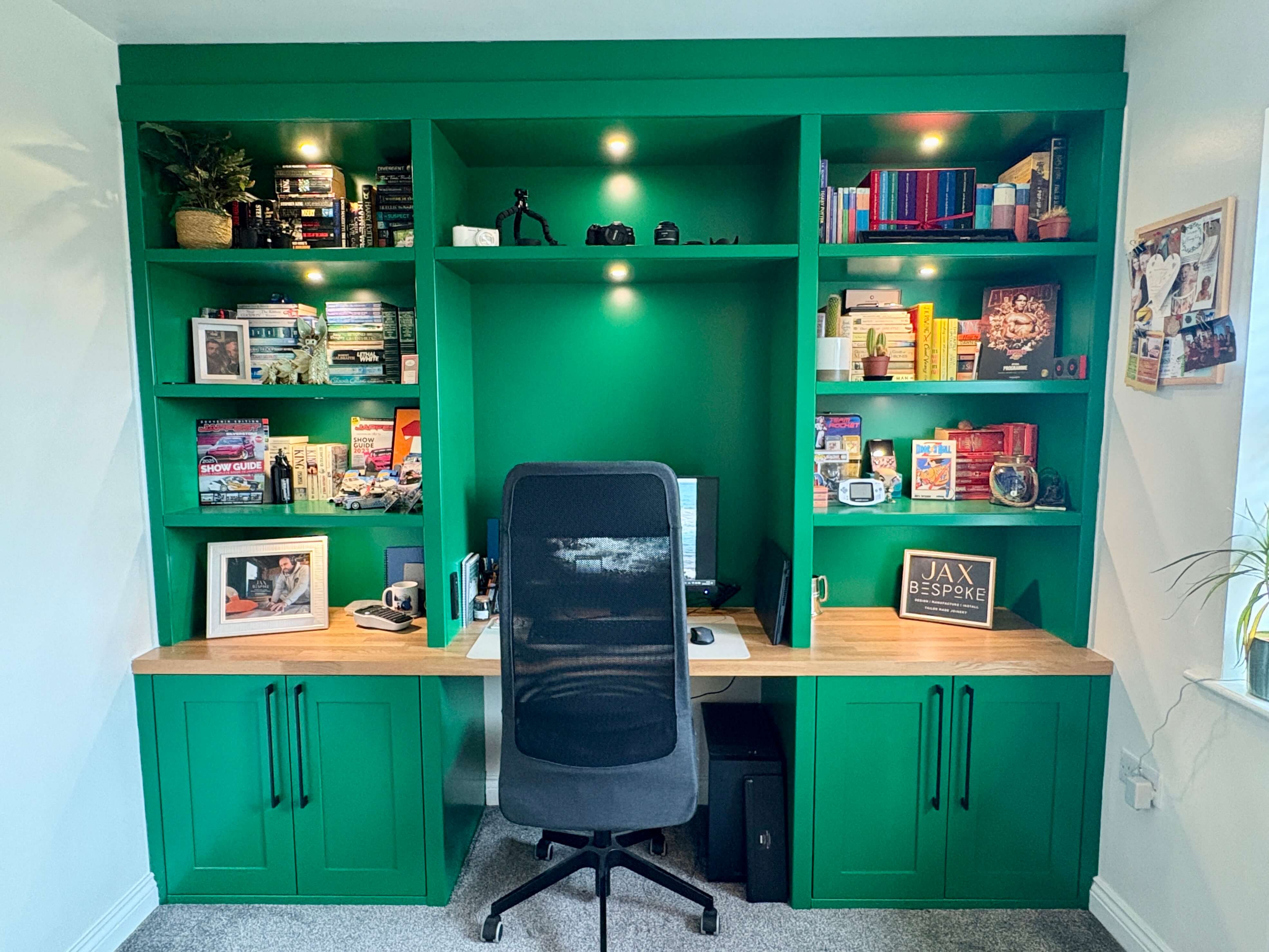 Bespoke fitted home office with integrated desk, shelving and concealed storage, designed and built by JAX Bespoke