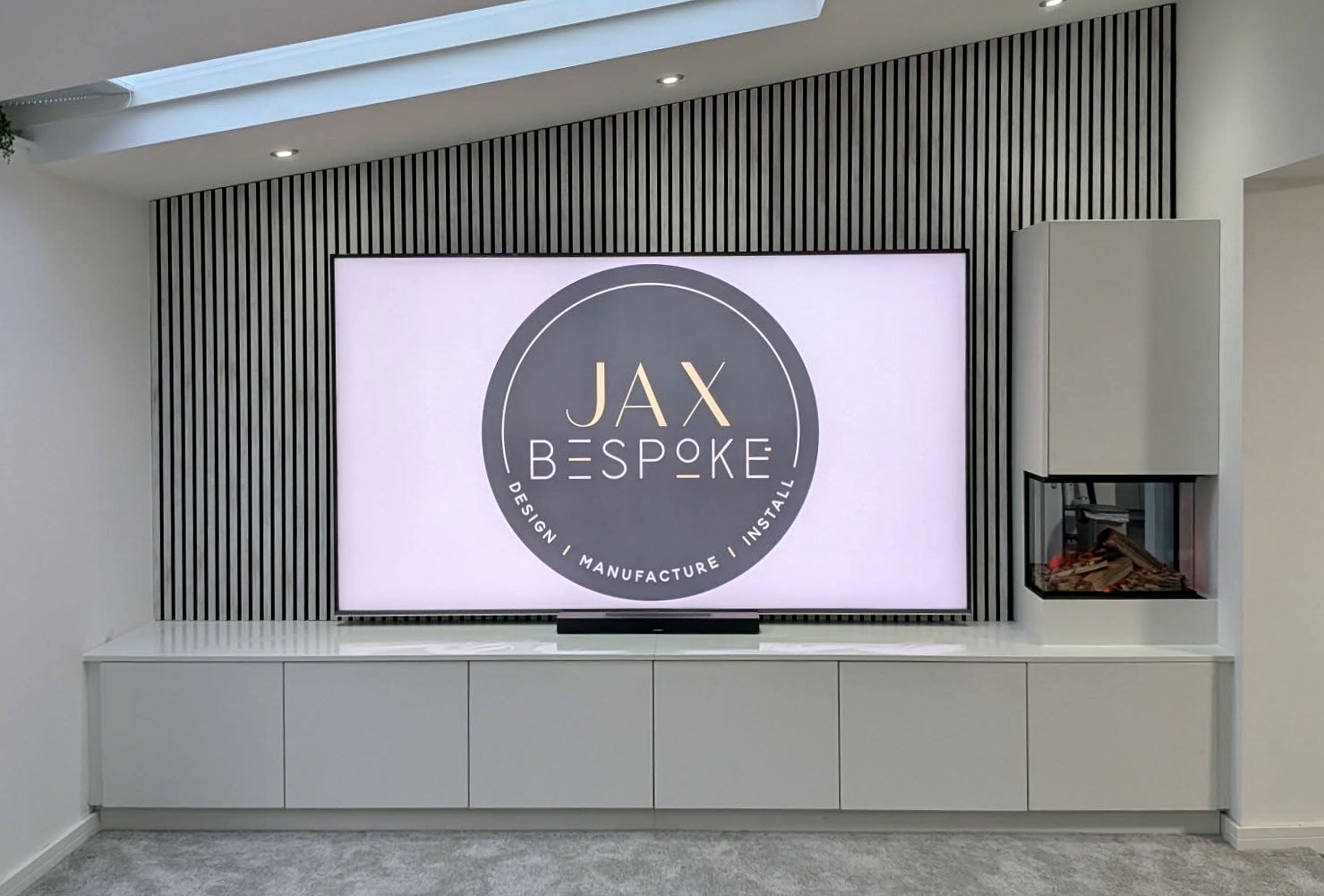 Bespoke cabinetry media wall with integrated TV unit, designed and installed by JAX Bespoke Yorkshire