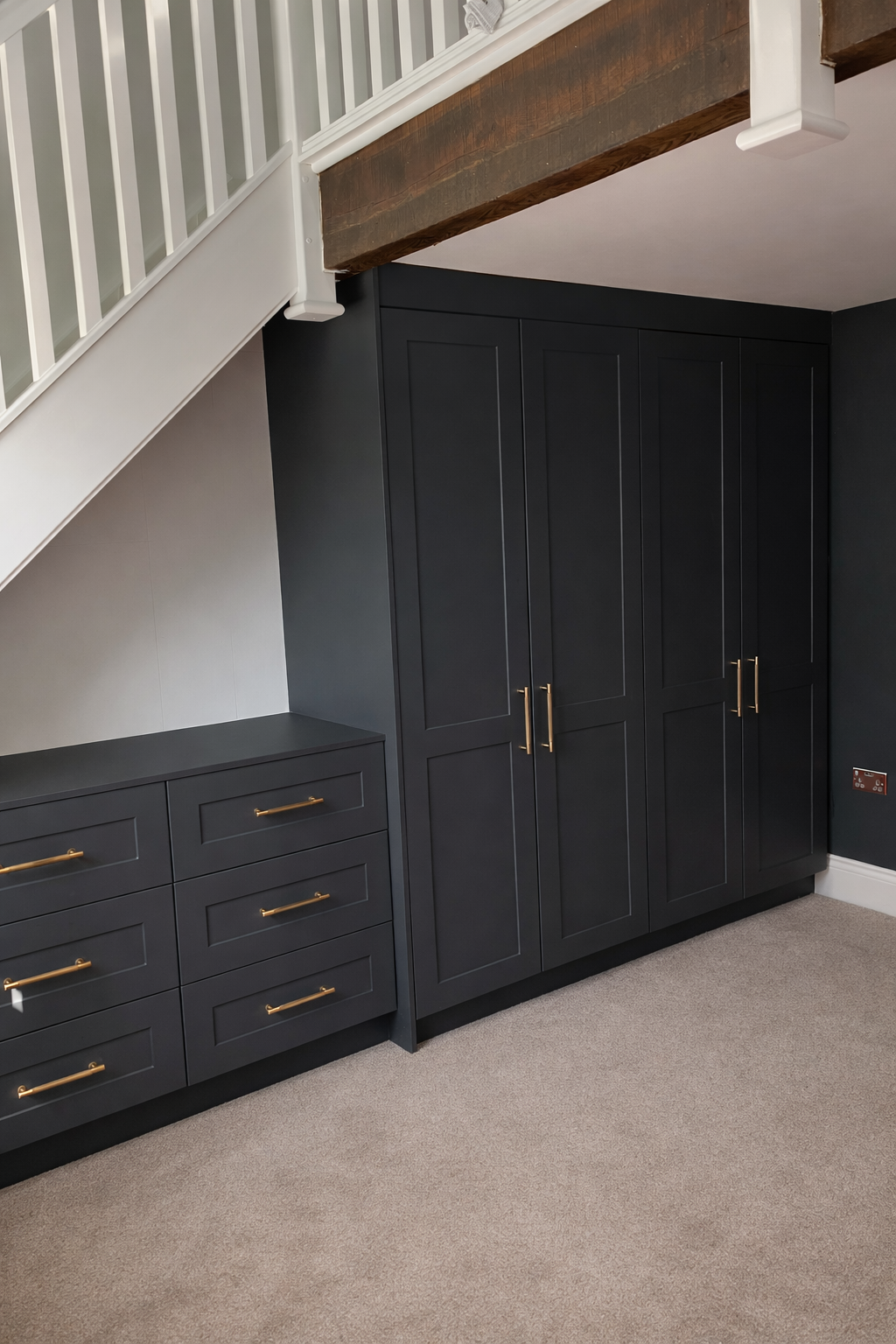 under stairs fitted wardrobes with integrated drawers bespoke storage solution UK