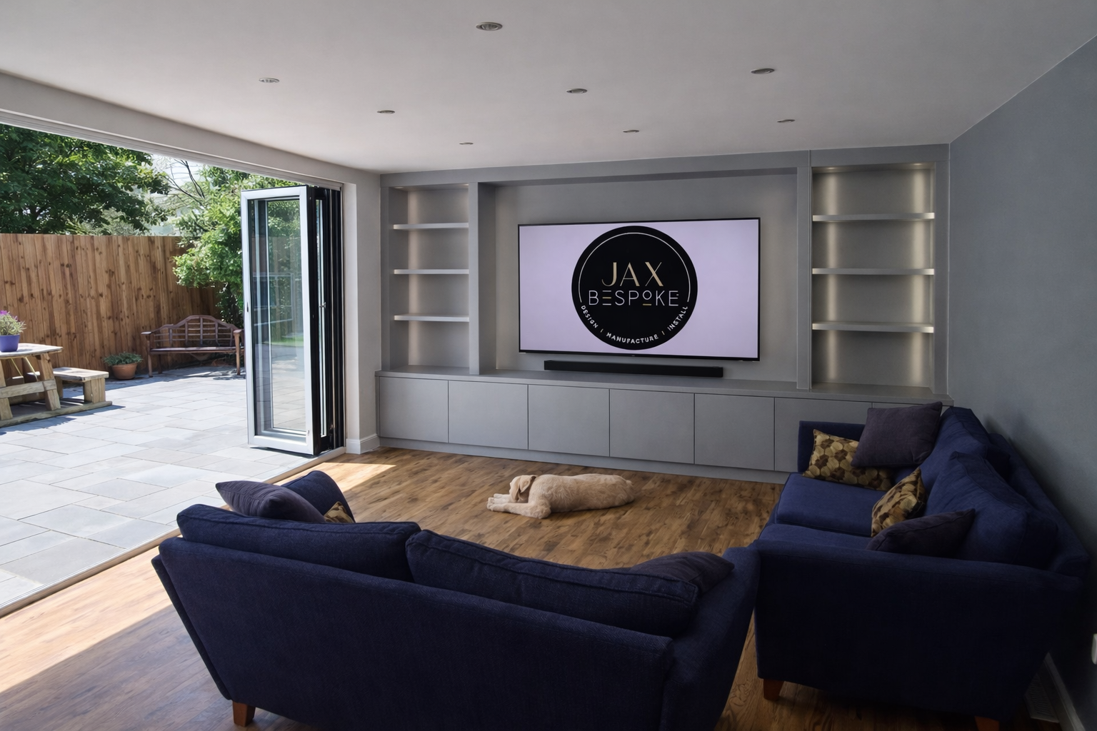 Bespoke media wall in a garden room with bifold doors creating the perfect World Cup home viewing setup