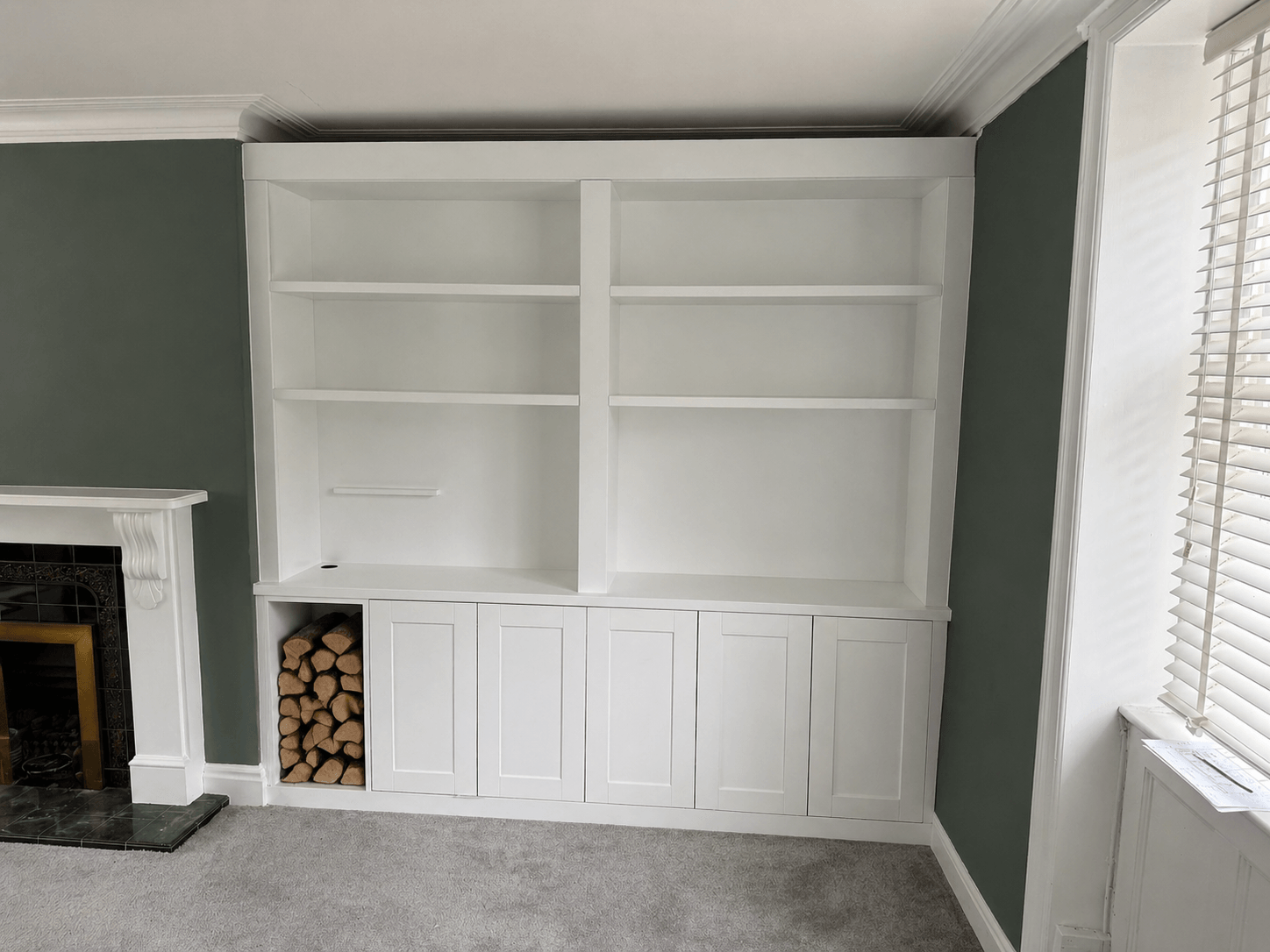 Custom fitted alcove shelving and cabinetry built precisely into a Sheffield period home, by JAX Bespoke
