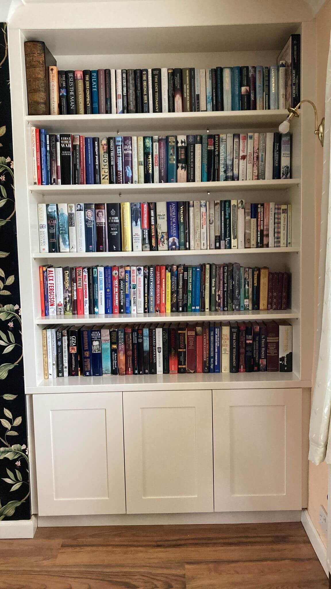 Bespoke fitted alcove bookcase with open shelving and lower cabinetry, installed in a Sheffield period home by JAX Bespoke