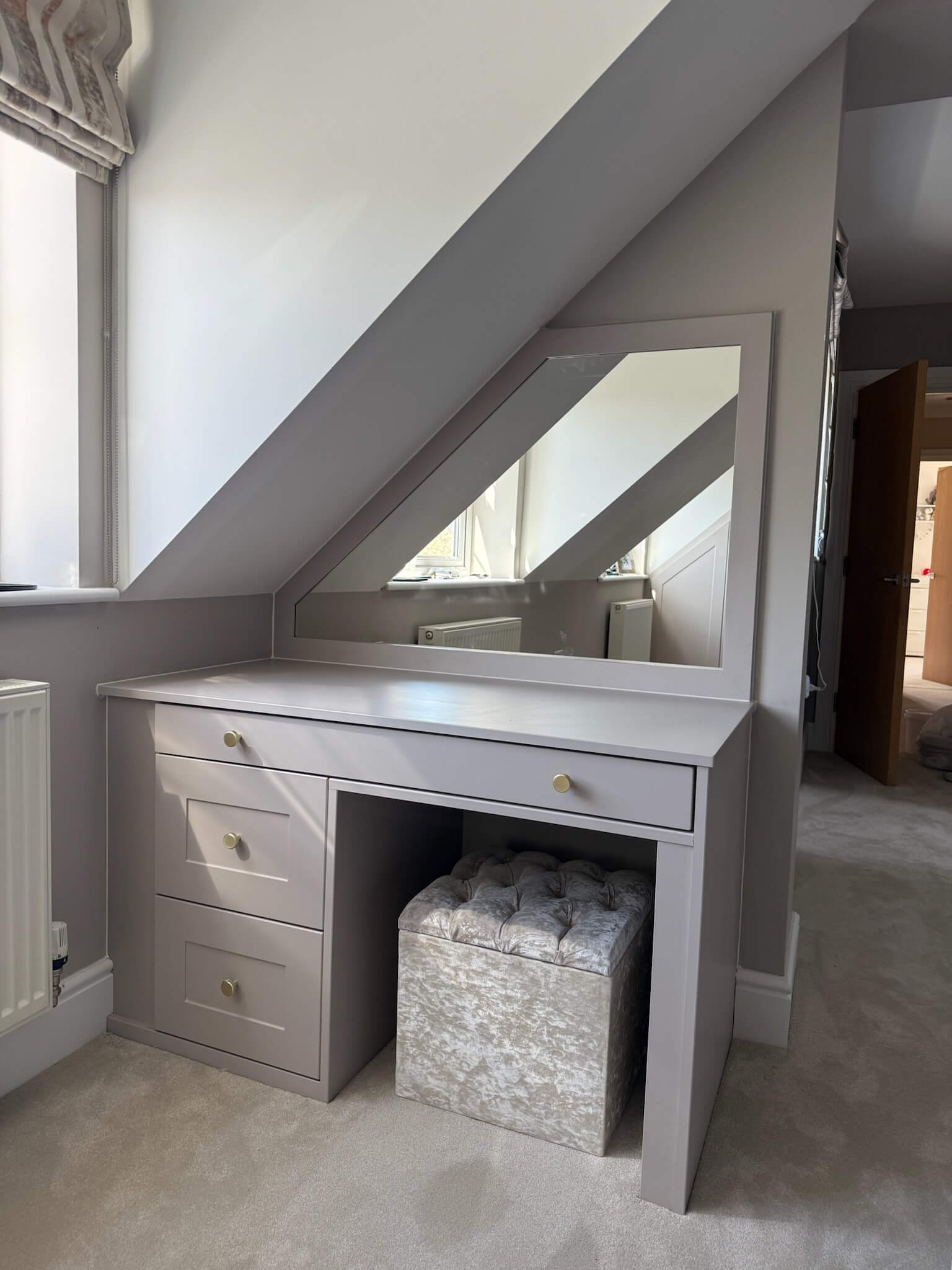 Bespoke bedroom furniture with fitted wardrobes and matching pieces designed as a cohesive scheme, by JAX Bespoke