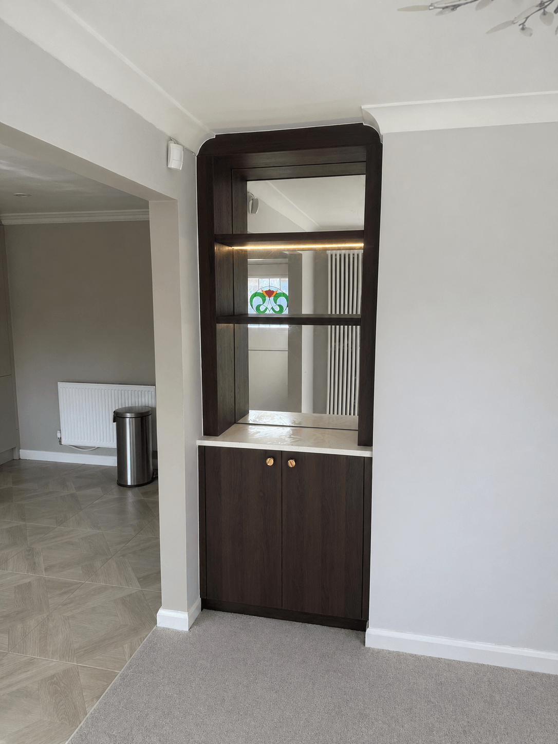 Bespoke fitted wardrobe with painted finish and organised interior, designed and installed by JAX Bespoke