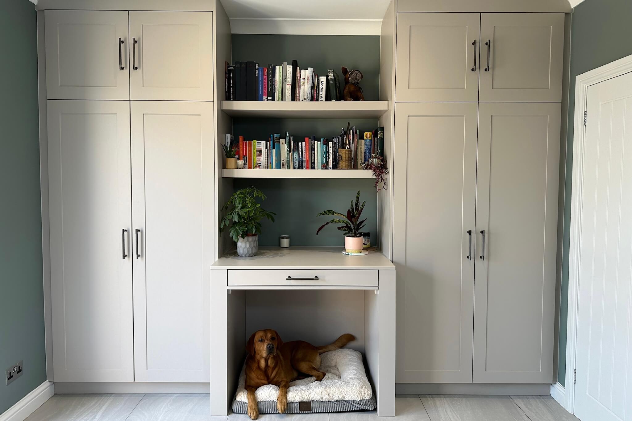 Bespoke fitted utility room with painted cabinetry, integrated storage and laundry space, designed and installed by JAX Bespoke