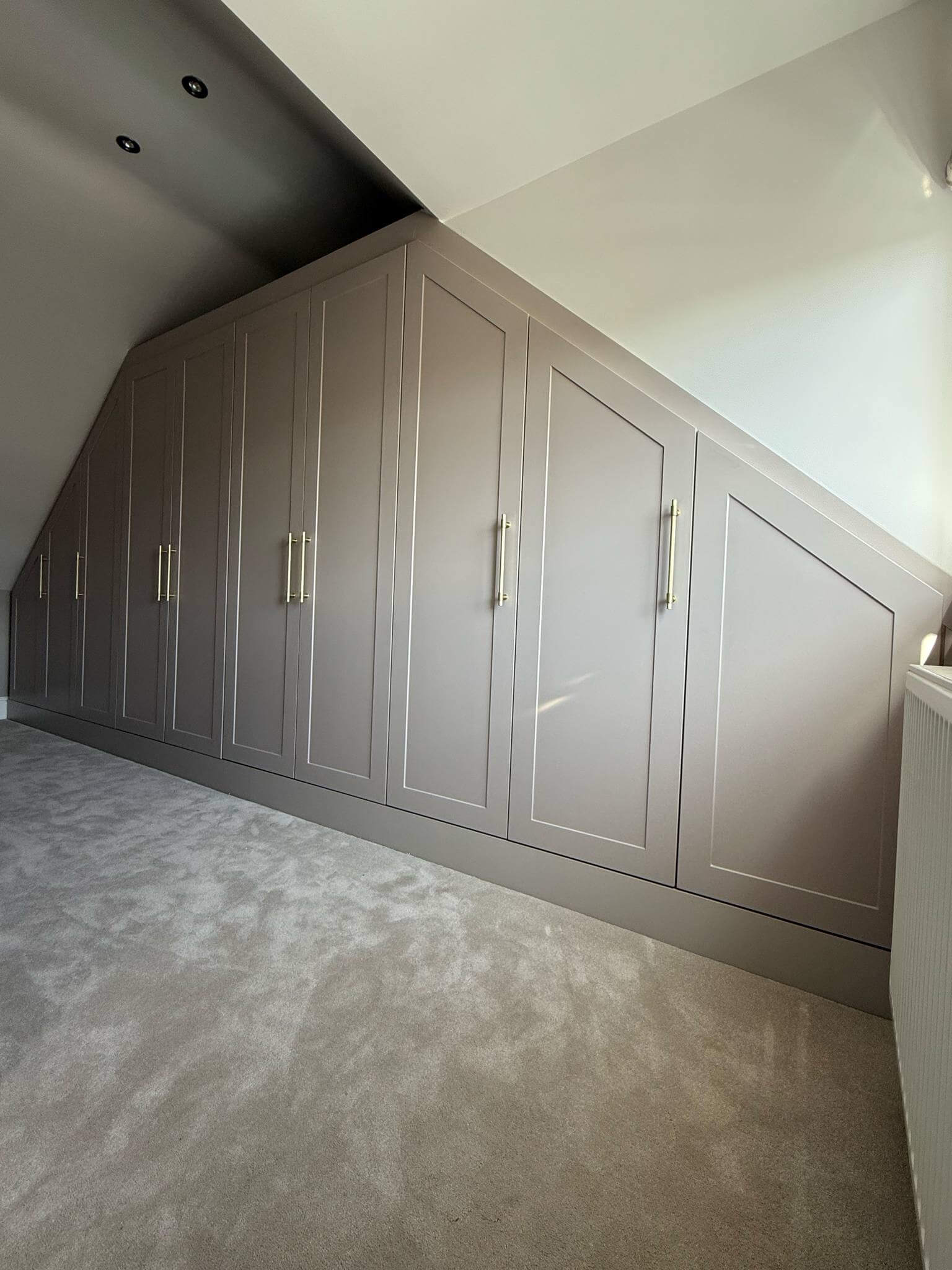 Completed bespoke fitted wardrobe installation — floor-to-ceiling handcrafted cabinetry with painted finish, designed and installed by JAX Bespoke Yorkshire